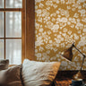 White florals with golden background styled in cozy interior 