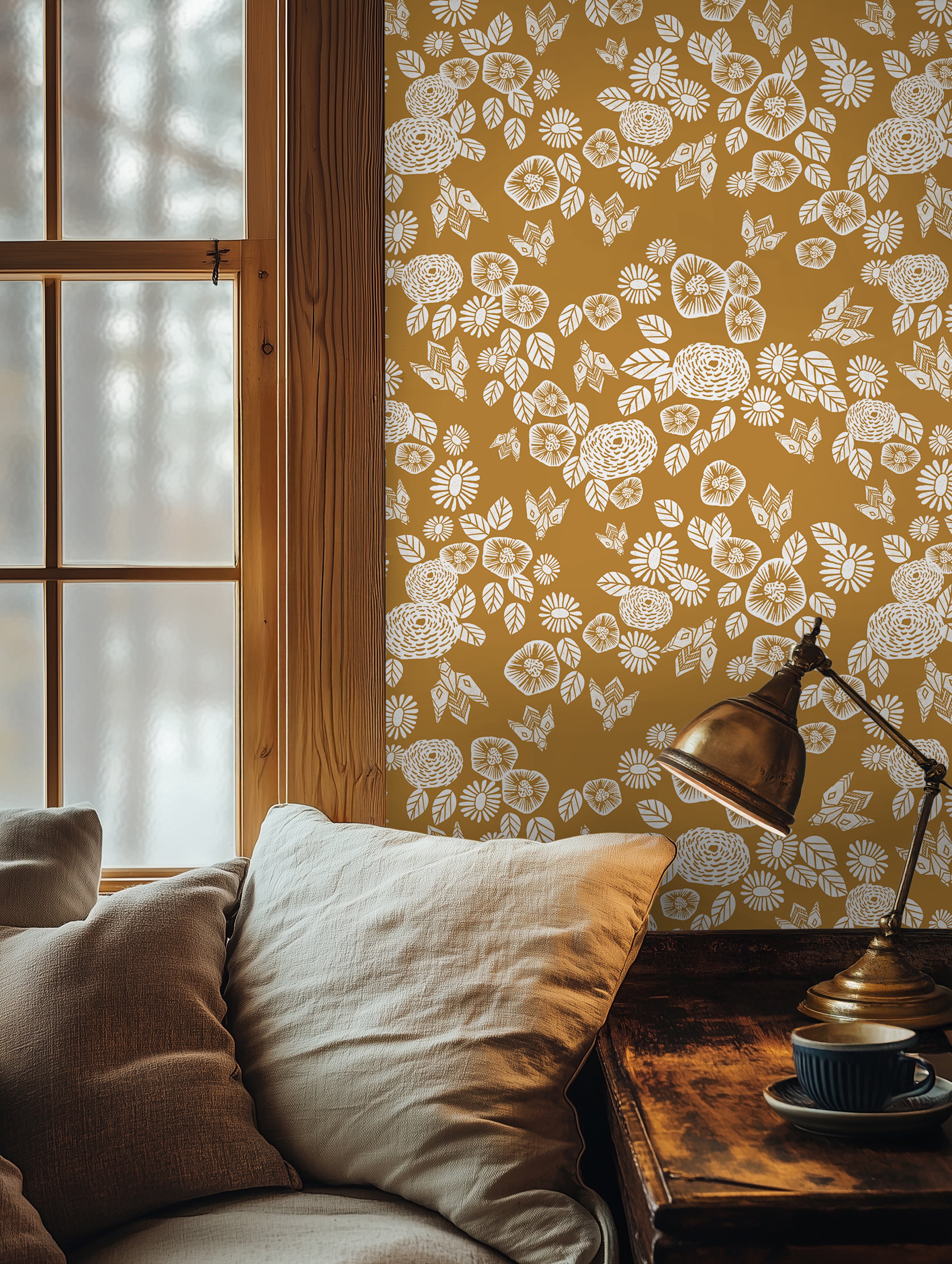 White florals with golden background styled in cozy interior 