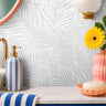 gray and white ferns in eclectic bathroom