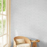 Gray and white geometric pattern in reading corner