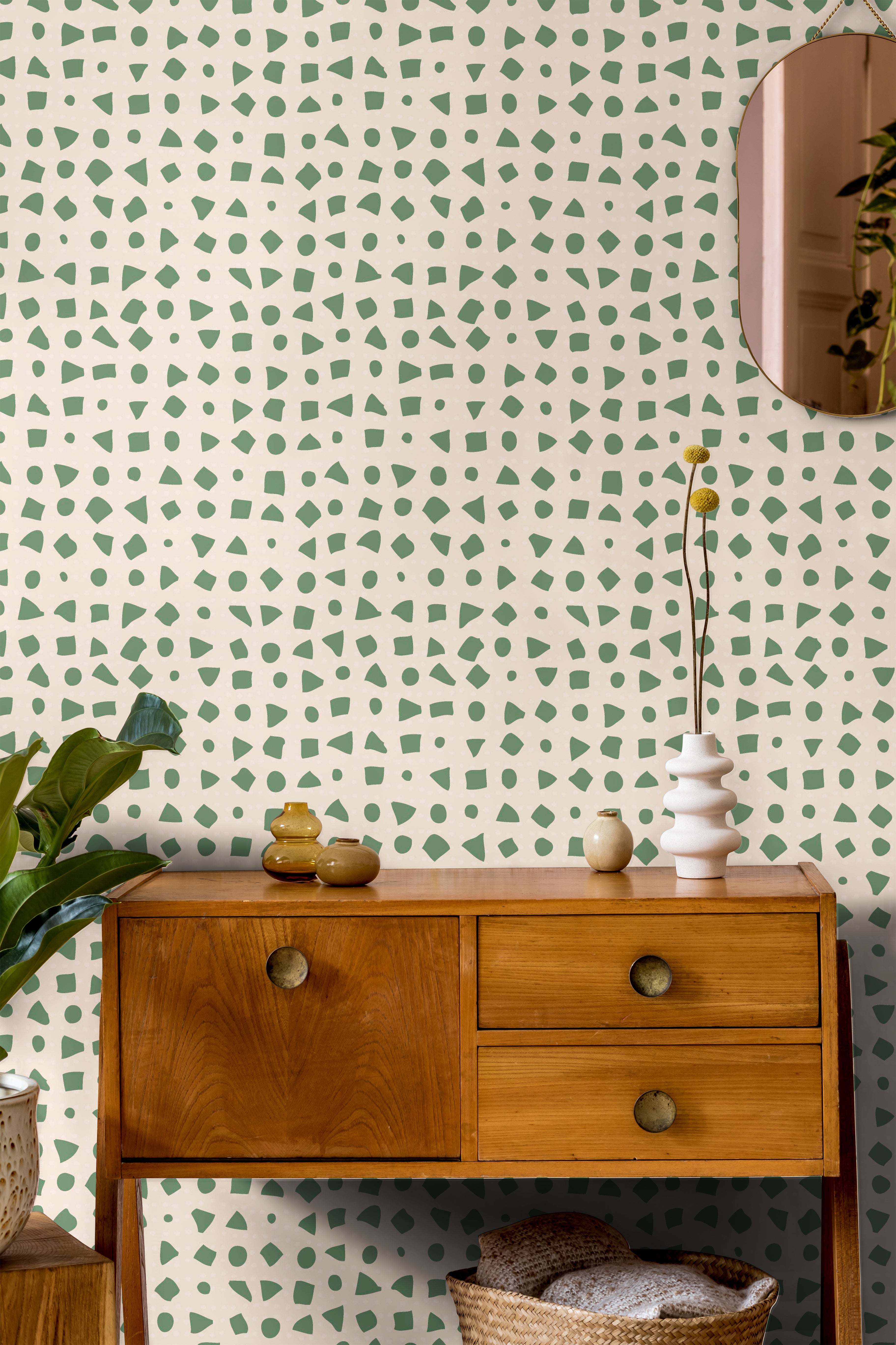 Abstract green shapes on cream in brightly lit interior living space