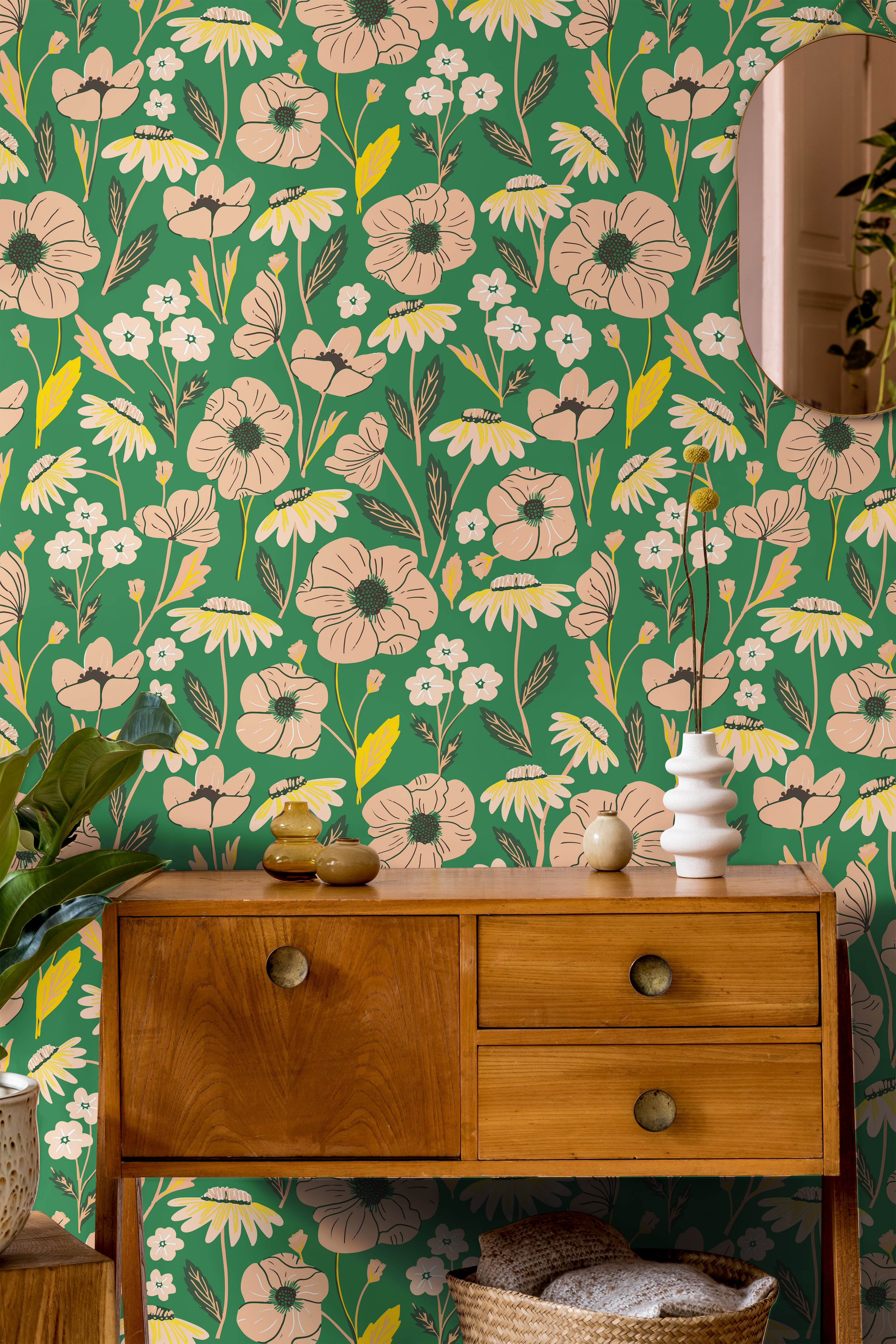 Blush pink florals on bright green background styled with warm wood tones and 