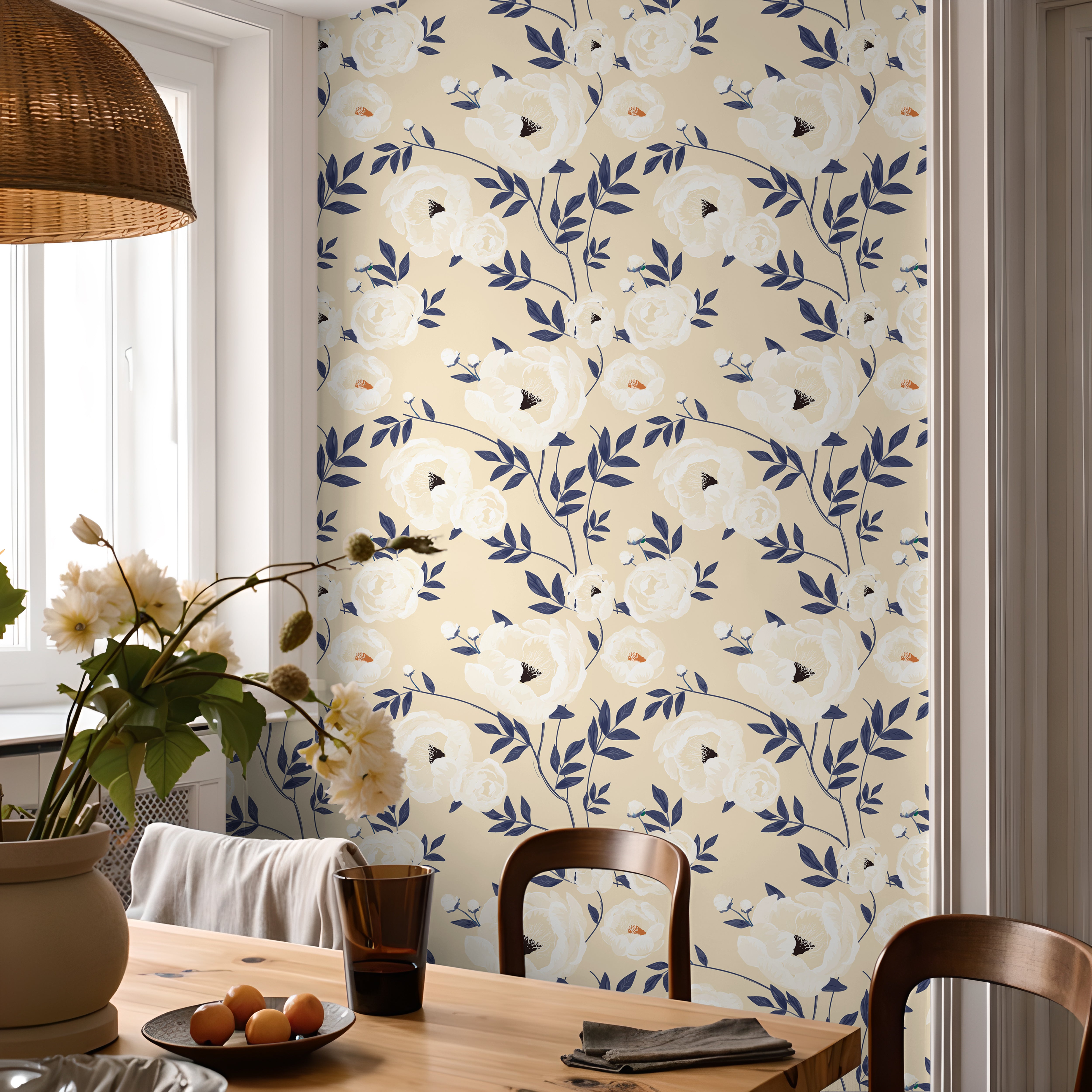Ivory peonys with dark blue leaves styled in warm dining room