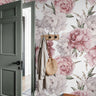 Watercolor purple and pink large scale peonies with green painted accent door in farmhouse entryway