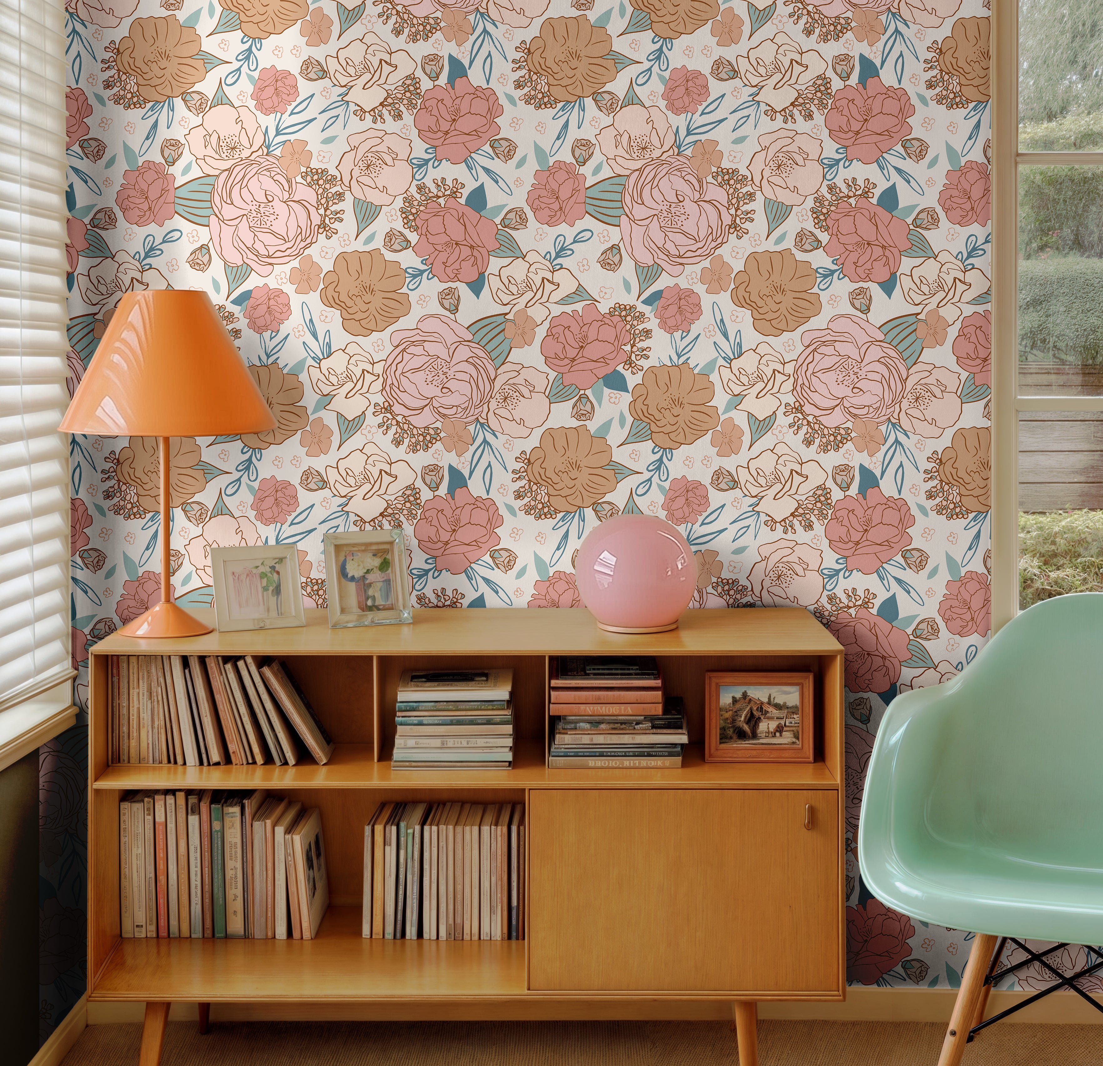 Large pink and orange florals styled in mid century modern living space