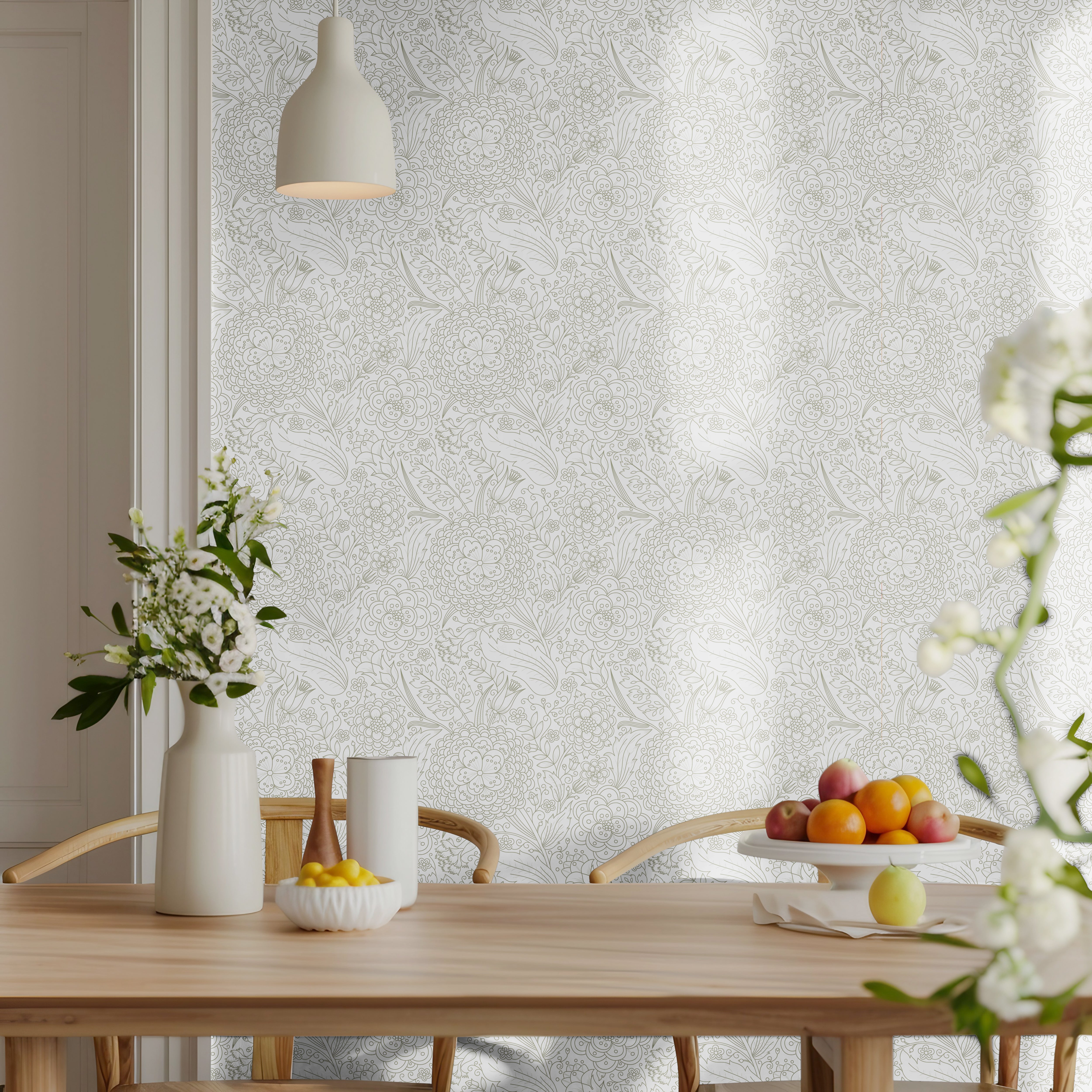 Hand drawn line art florals with white background styled in bright dining room interior