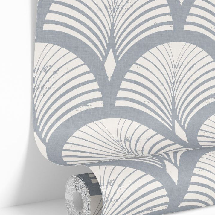 Blue-gray geometric wallpaper roll with art-deco fan pattern on linen-textured background