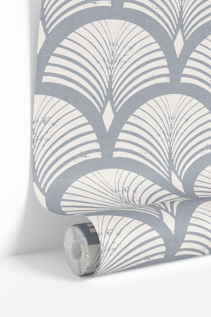 Blue-gray geometric wallpaper roll with art-deco fan pattern on linen-textured background