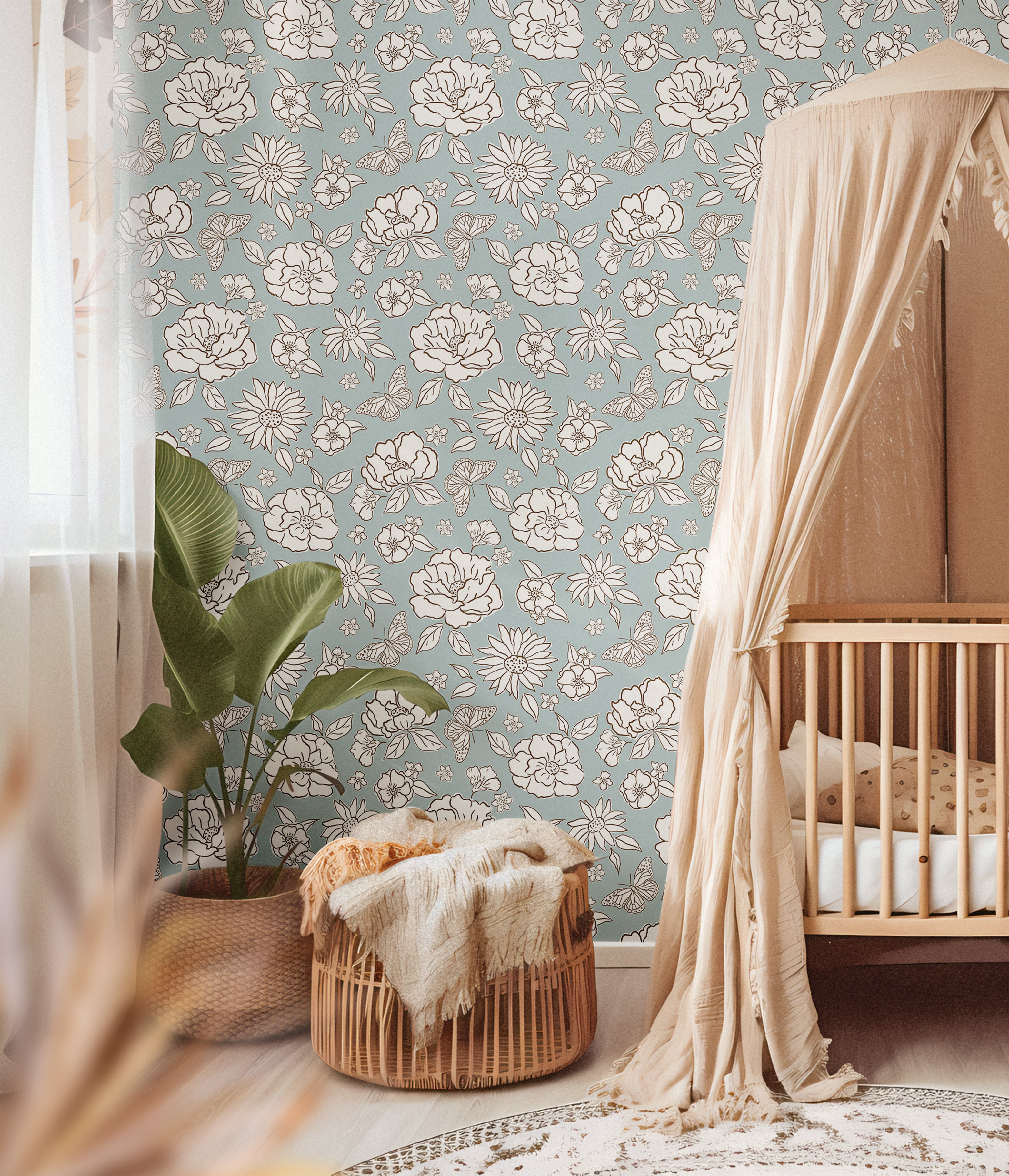 White florals on muted blue background in boho neutral nursery