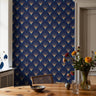 Navy blue with gold and teal art deco arches in warm cottage dining room