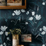 Dark navy tulips behind vintage feeling shelves 
