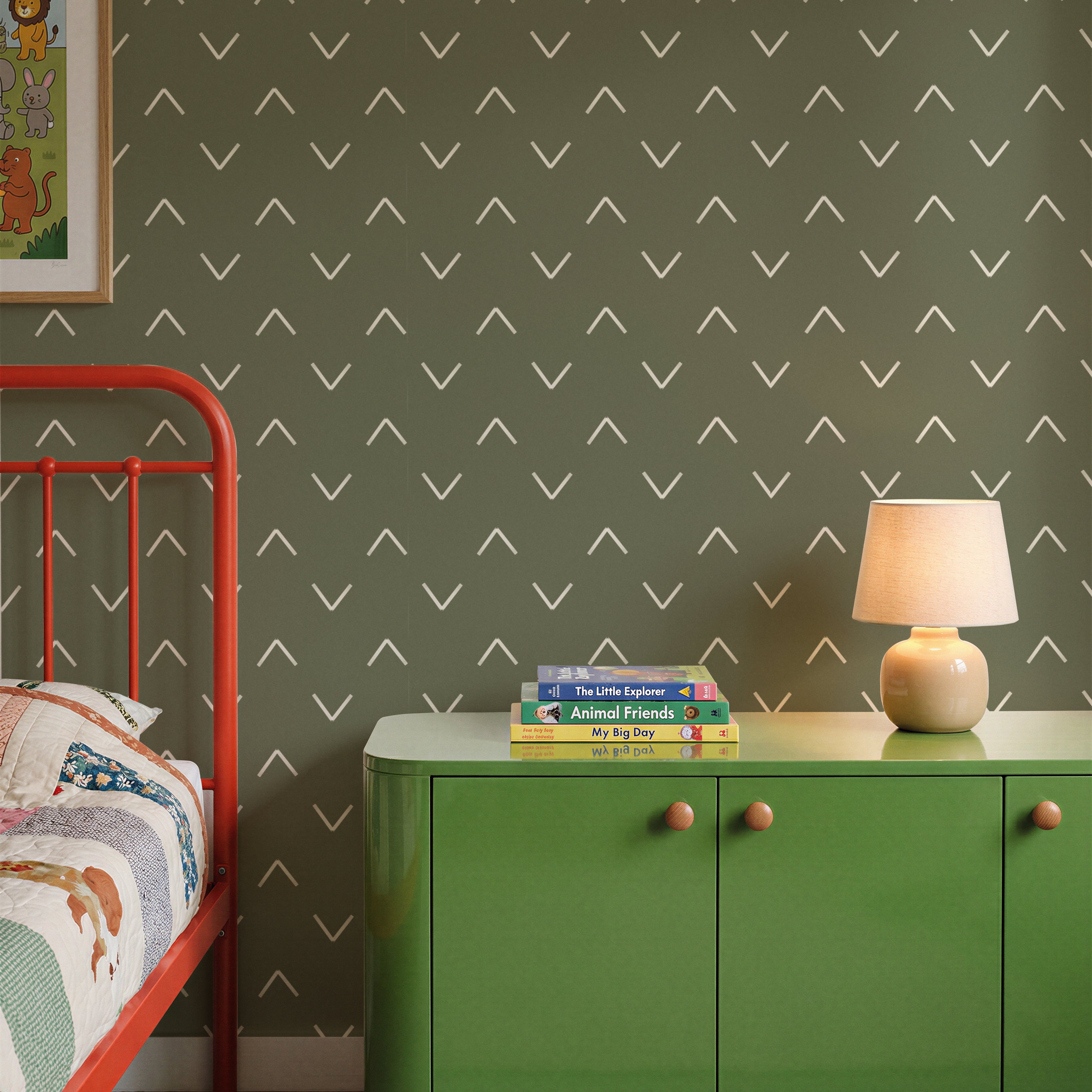Olive green wallpaper with cream chevrons in a geometrical wave pattern in a colorful kids bedroom