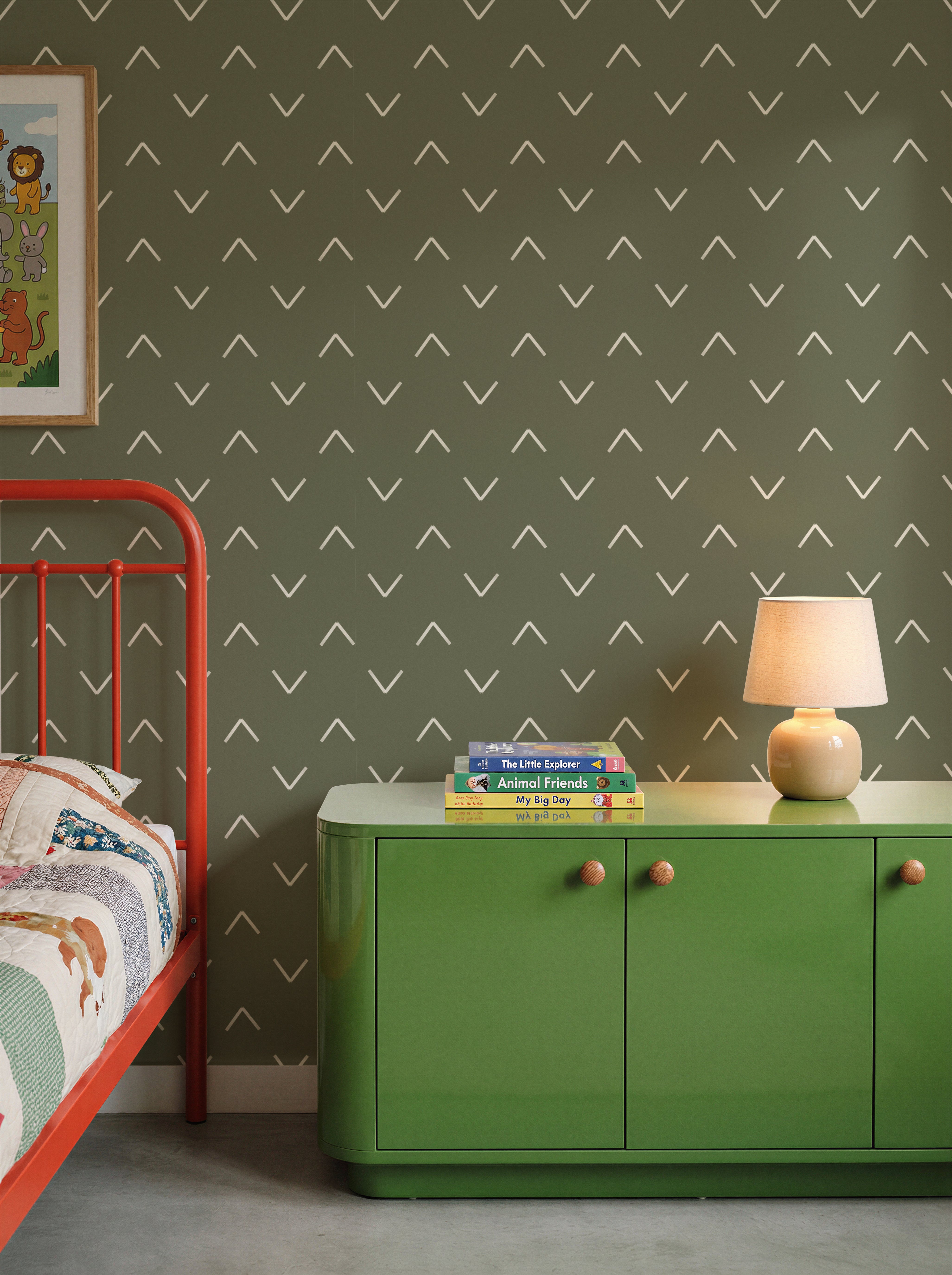 Olive green wallpaper with cream chevrons in a geometrical wave pattern in a colorful kids bedroom