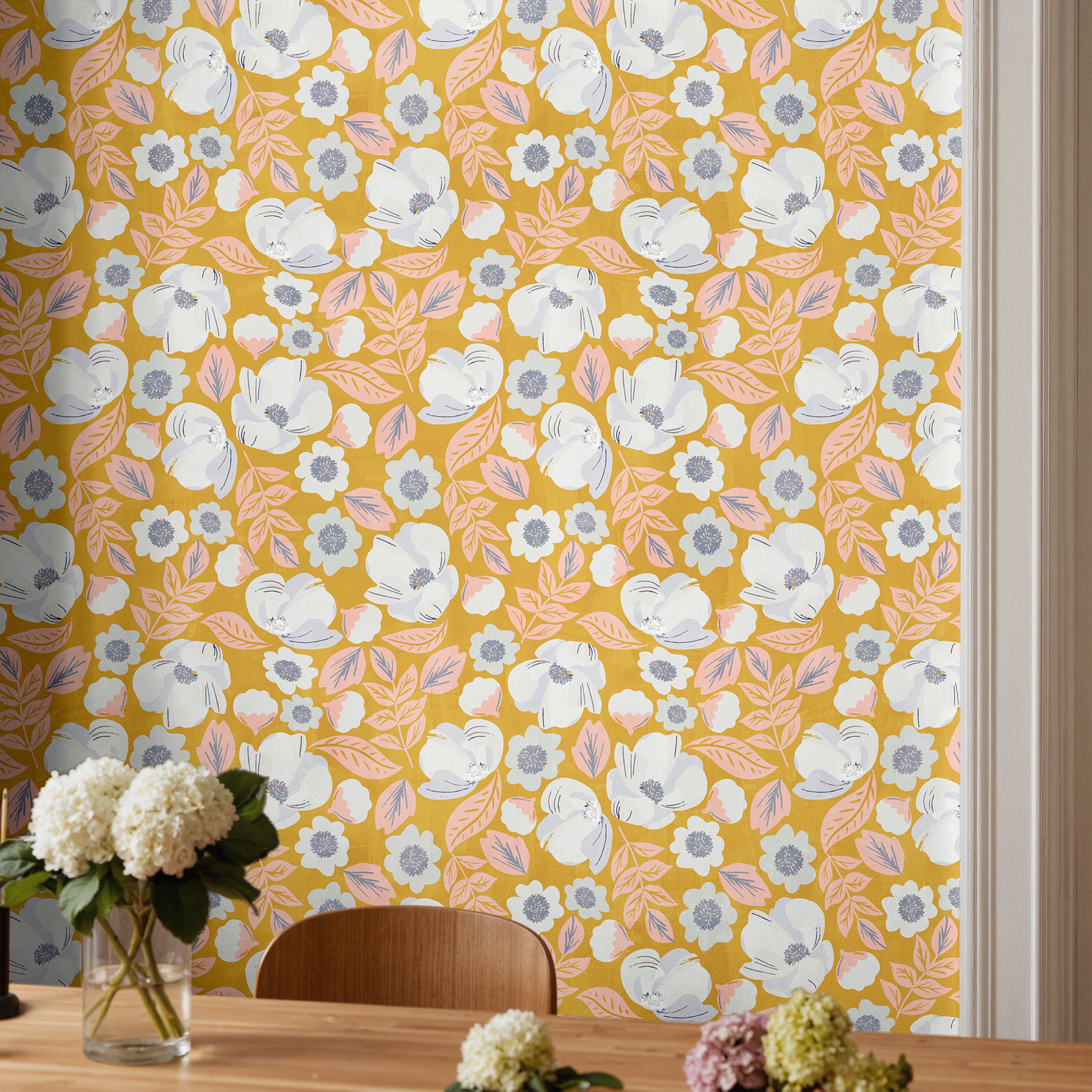 large white florals with orange leaves and a yellow-orange background with painted textures