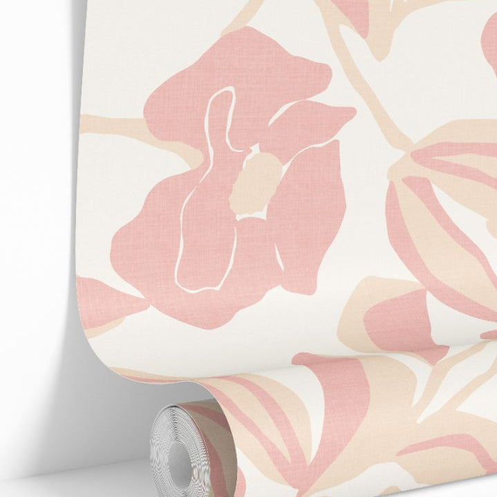 Blush floral wallpaper roll with beige leaves on a soft ivory background