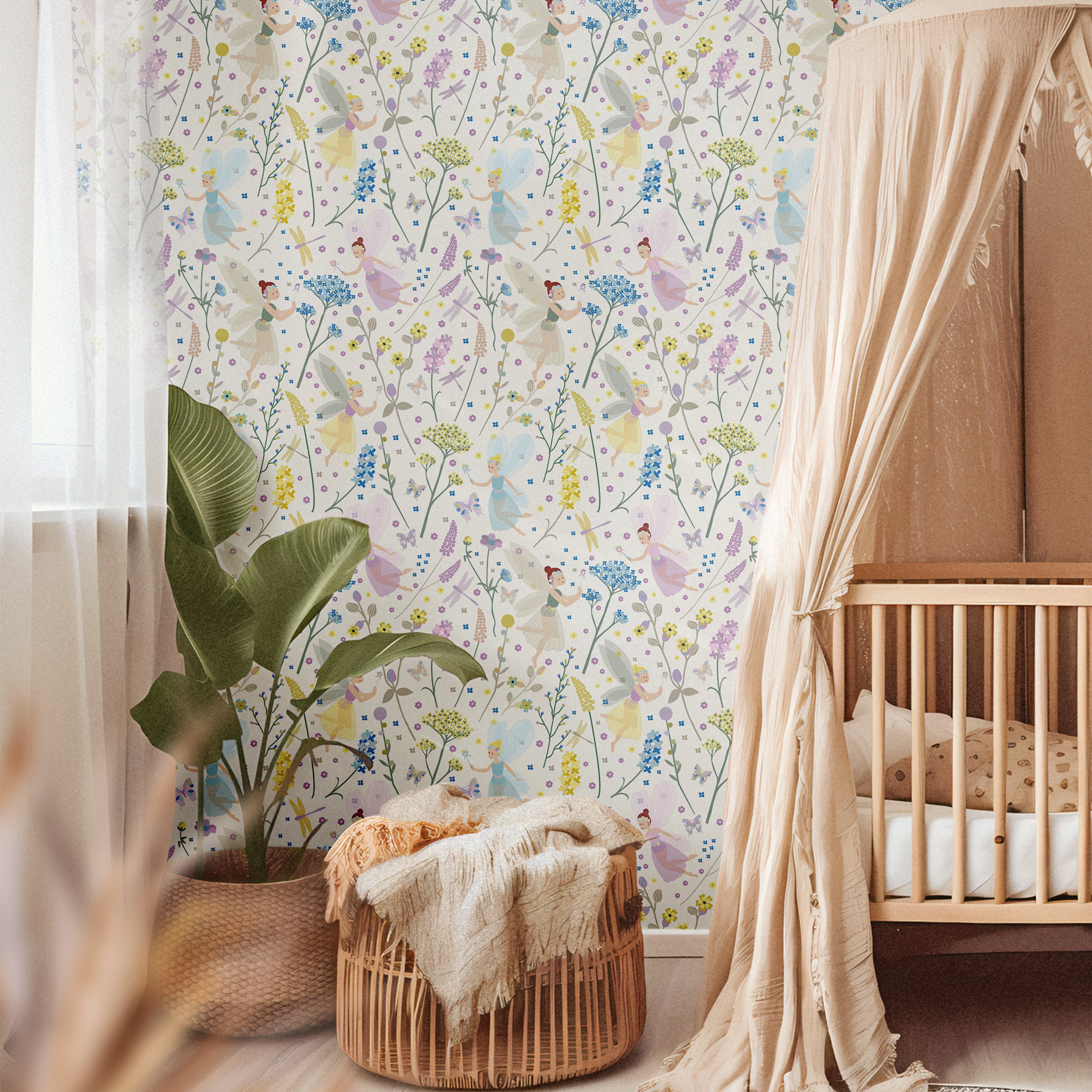 Blue yellow and pink fairy wallcovering in brightly lit nursery