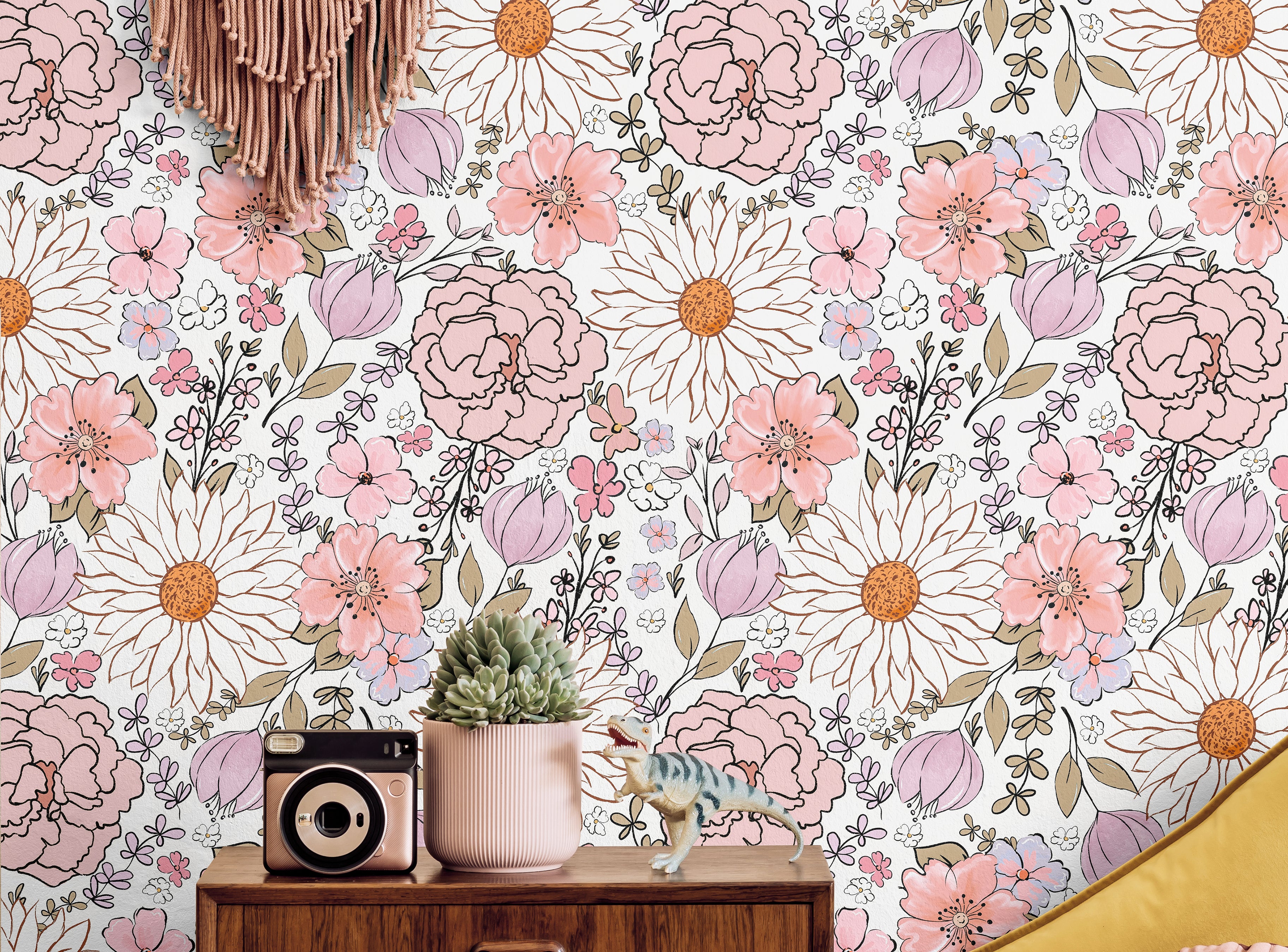 Pink and purple large floral styled in boho living area