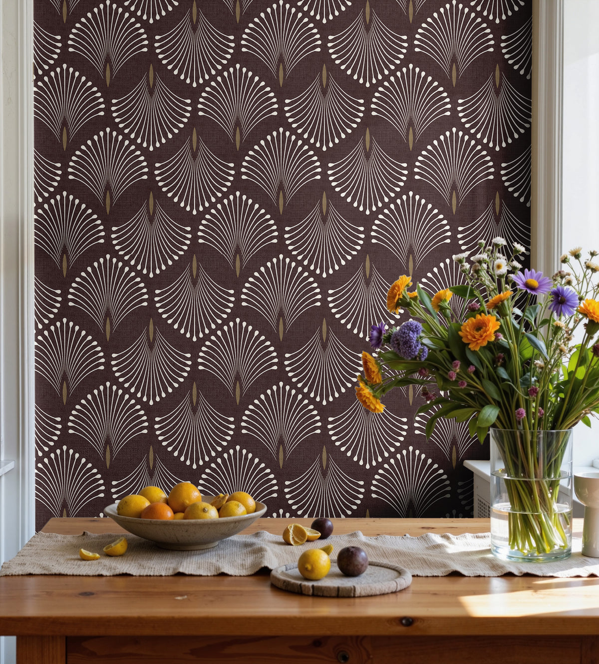 Dining room interior featuring Port & Pin plum geometric wallpaper with ivory fan motifs and antique-gold accents.