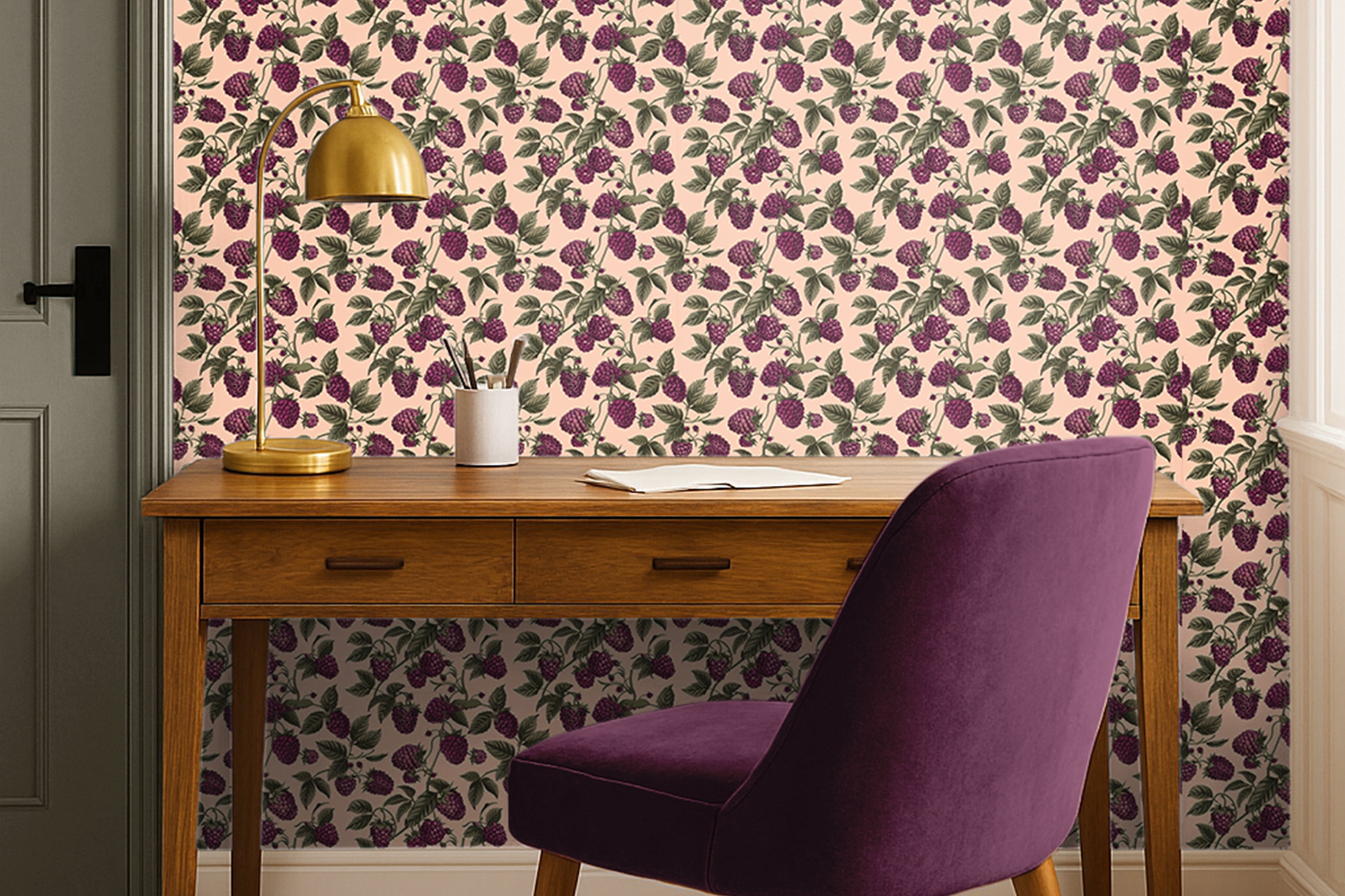 rich berry clusters, leafy greens, and soft blush backdrop styled in warm home office with green door and purple chair
