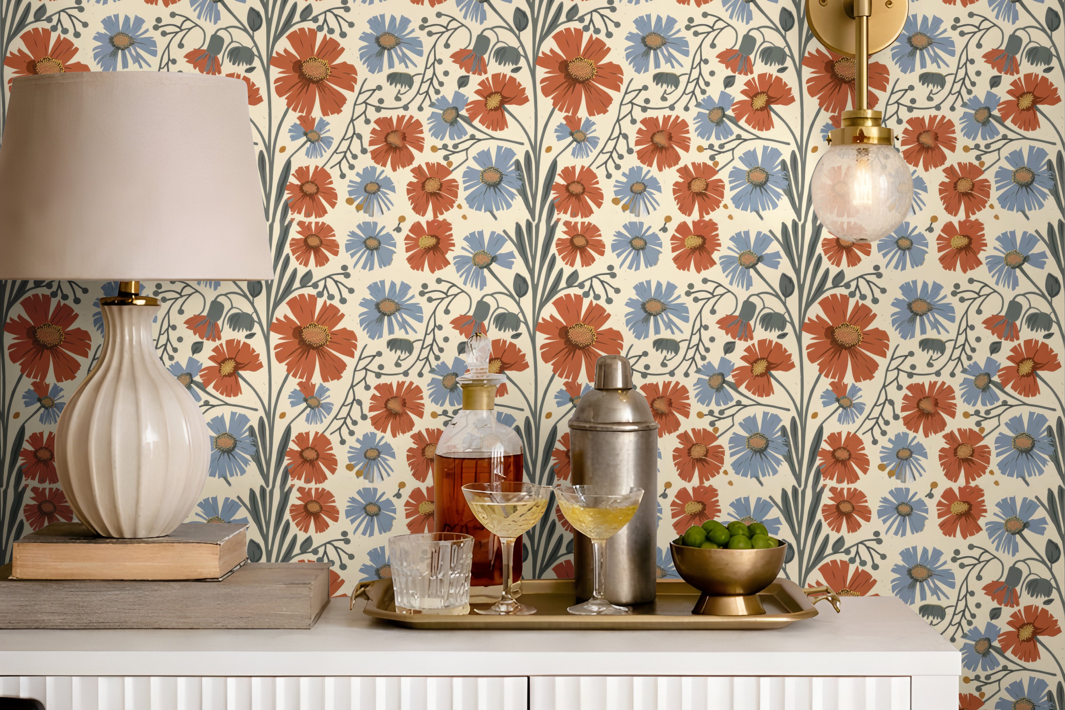 Red white and blue cosmo blossoms styled in living space behind credenza