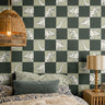 hand-drawn dinosaur illustrations with a structured checkerboard layout in muted green and warm neutral tones