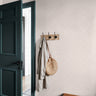 Art Deco soft blush tones and rhythmic dotted arches