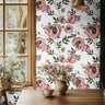 Mauve and pink Peonies with dark green leaves large scaled floral on contrasting white background in rustic dining room