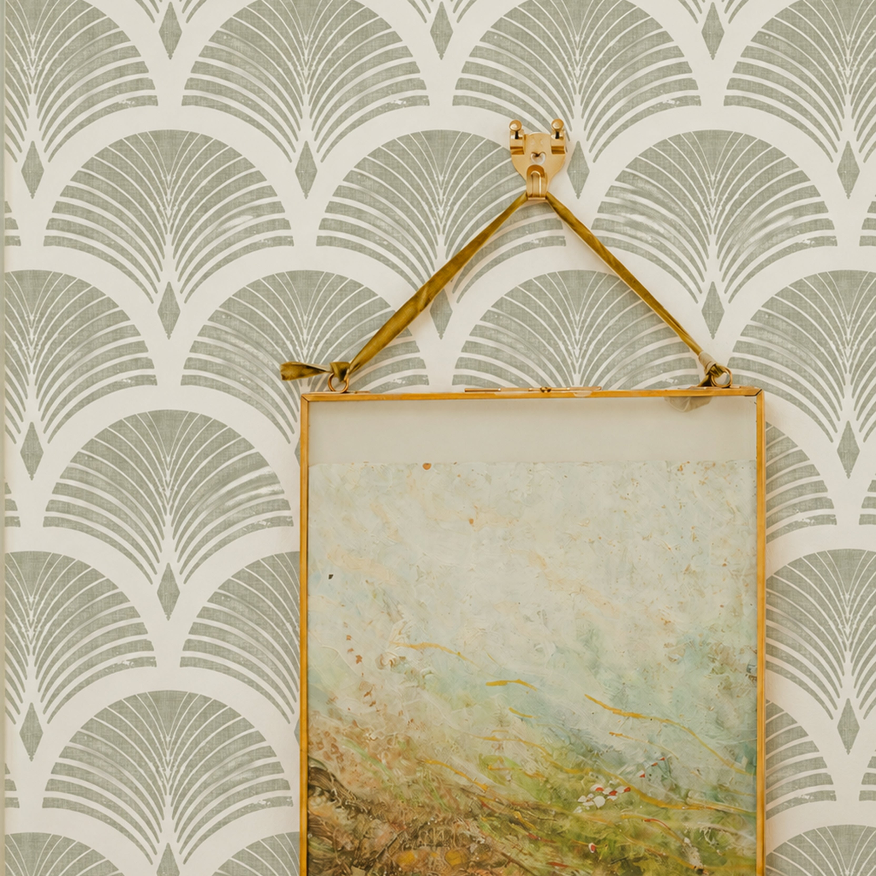 repeating olive green fan arches, fine radiating lines, and lightly distressed detailing on a warm ivory ground