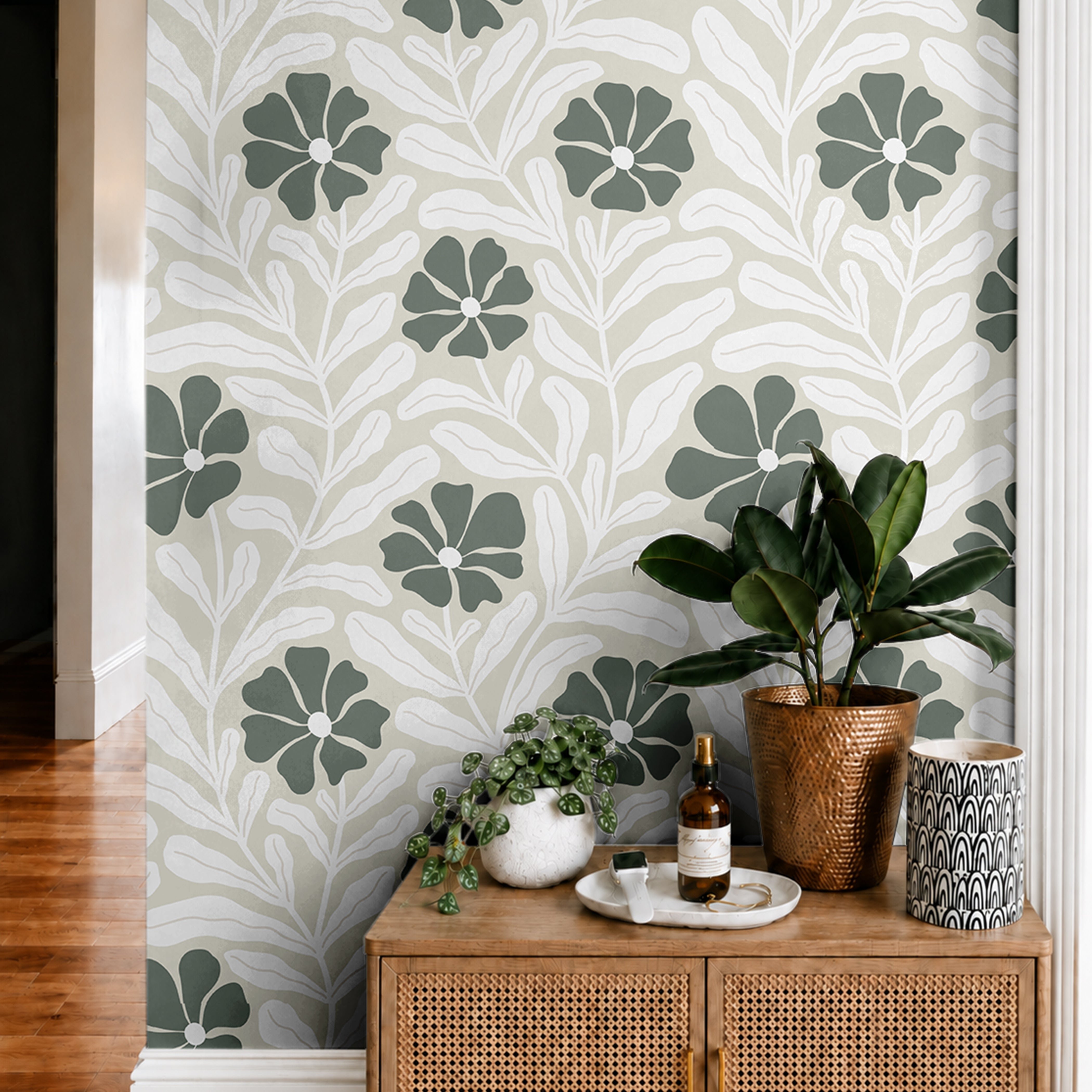 sage green wallpaper features modern leaf and petal forms in a repeating pattern that adds visual rhythm without overwhelming the space