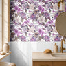 Large Purple Florals with golden sparkles with white background in warm natural bathroom