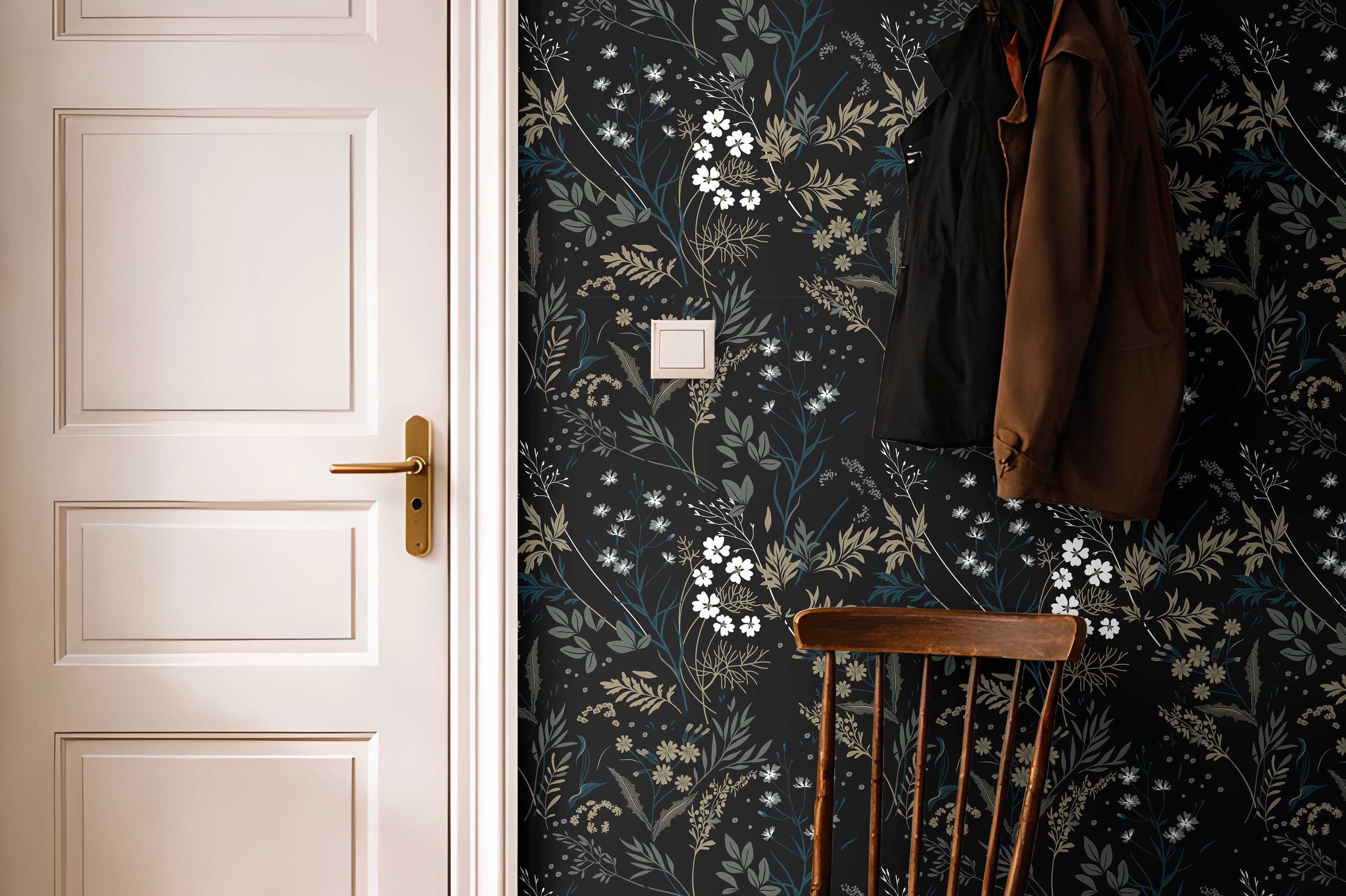 Moody florals with white accents styled in bright hallway with warm wooden accents