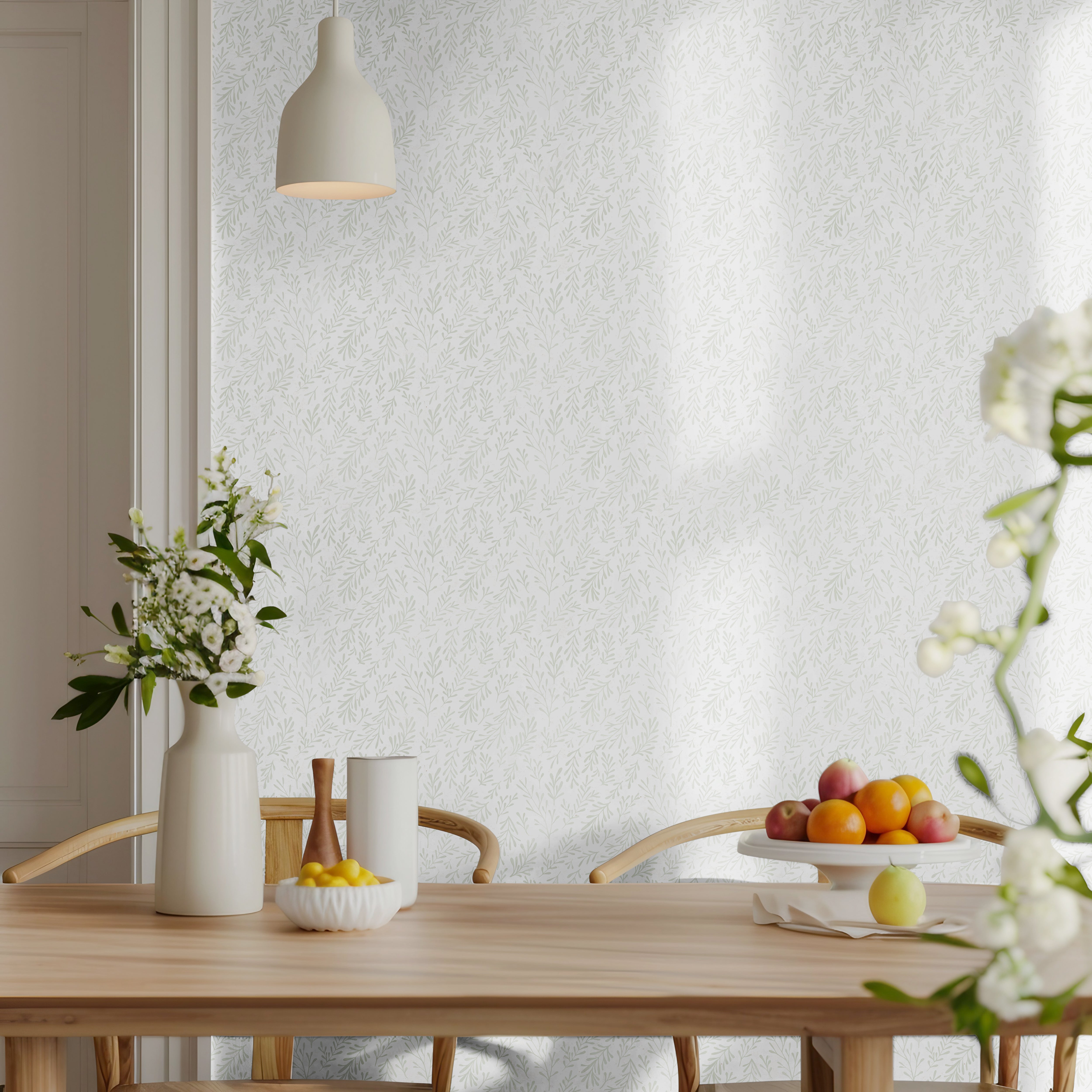 Subtle distressed beige leaves on white background in warm and bright living room