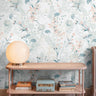Pastel wildflowers on white background in muted pink living room