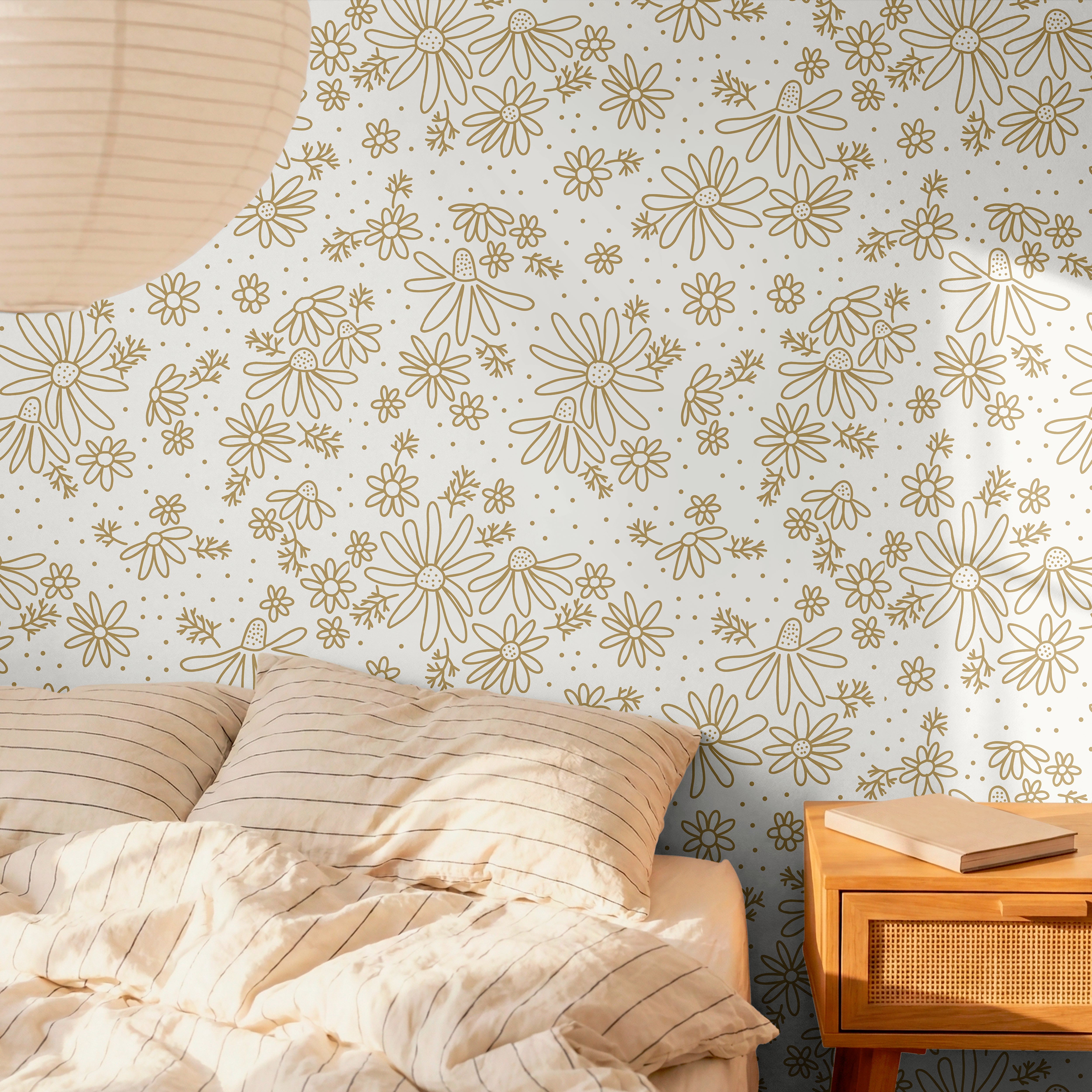 Cream background with golden hand drawn outlines of daises in warm neutral bedroom