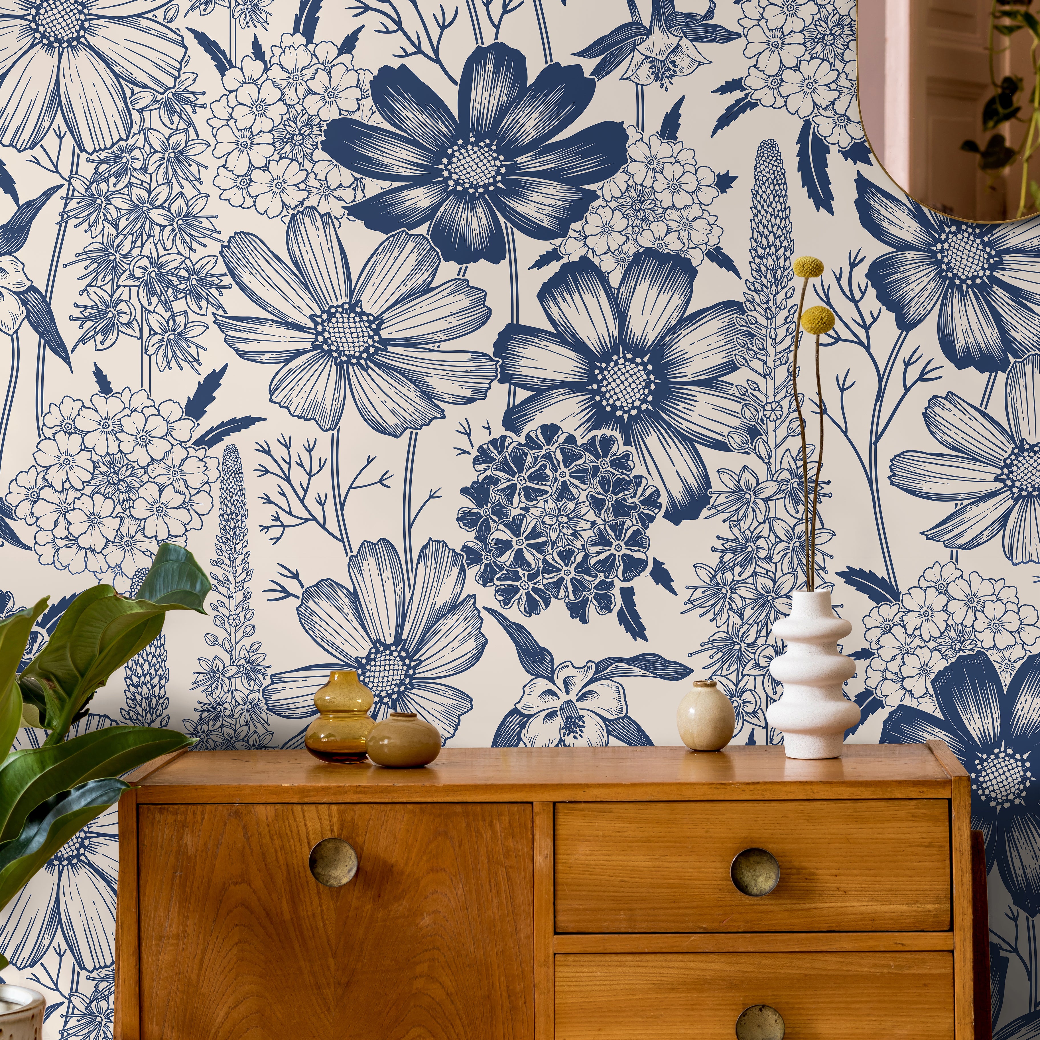 monotone blue wall covering in living area with warm wood accents