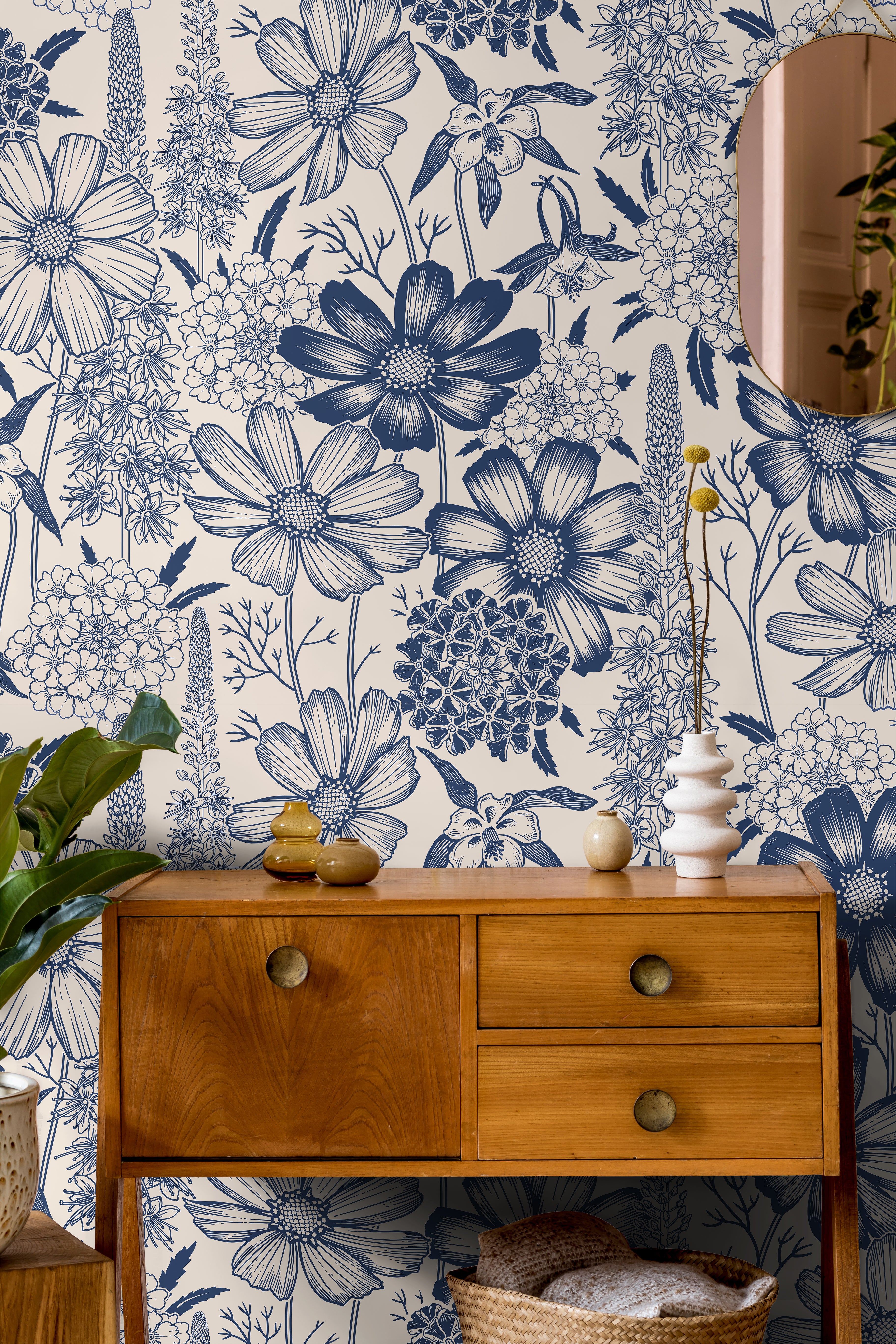 monotone blue wall covering in living area with warm wood accents