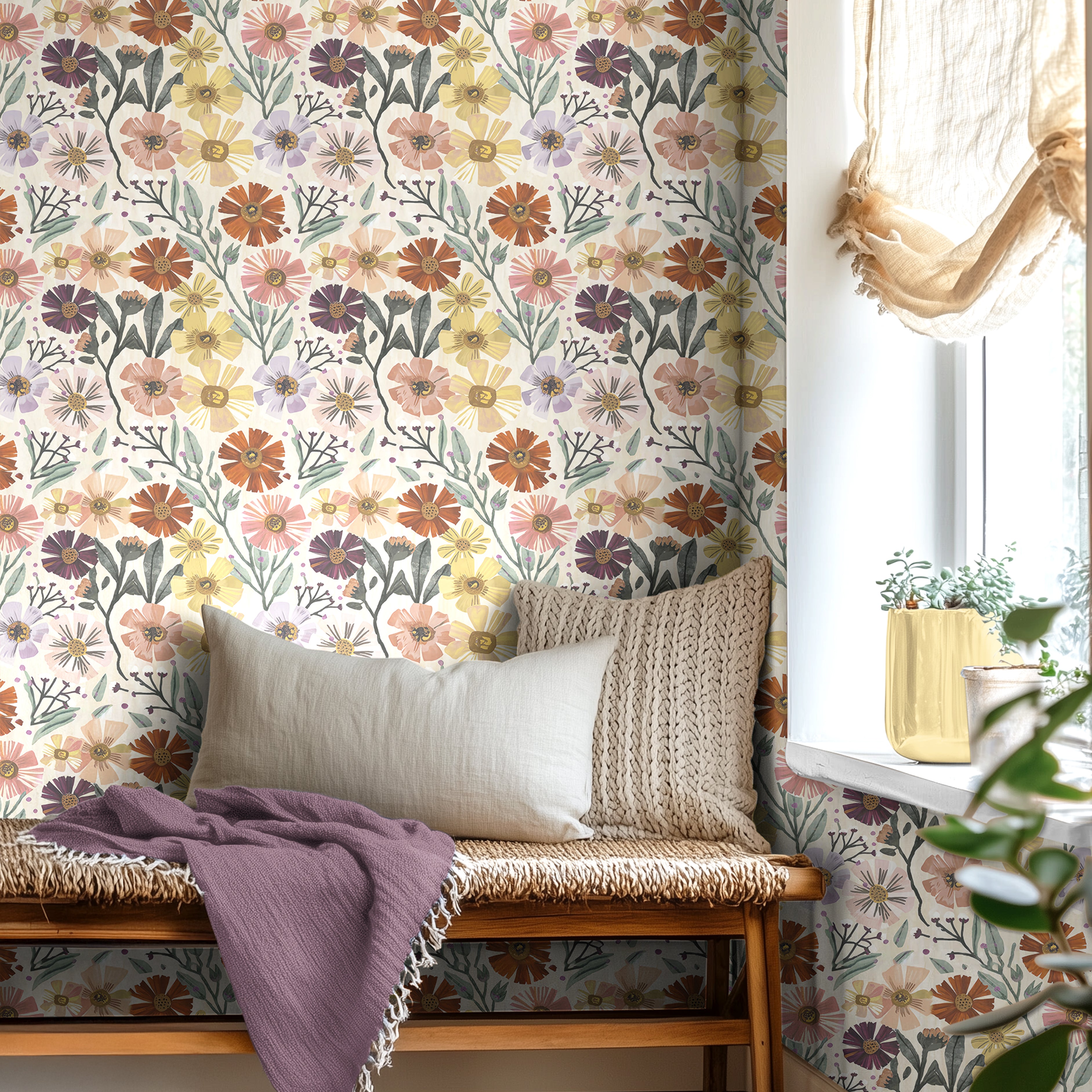 Colorful boho blooms in a whimsical pattern on a white background in a day bed living space