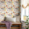 Colorful boho blooms in a whimsical pattern on a white background in a day bed living space