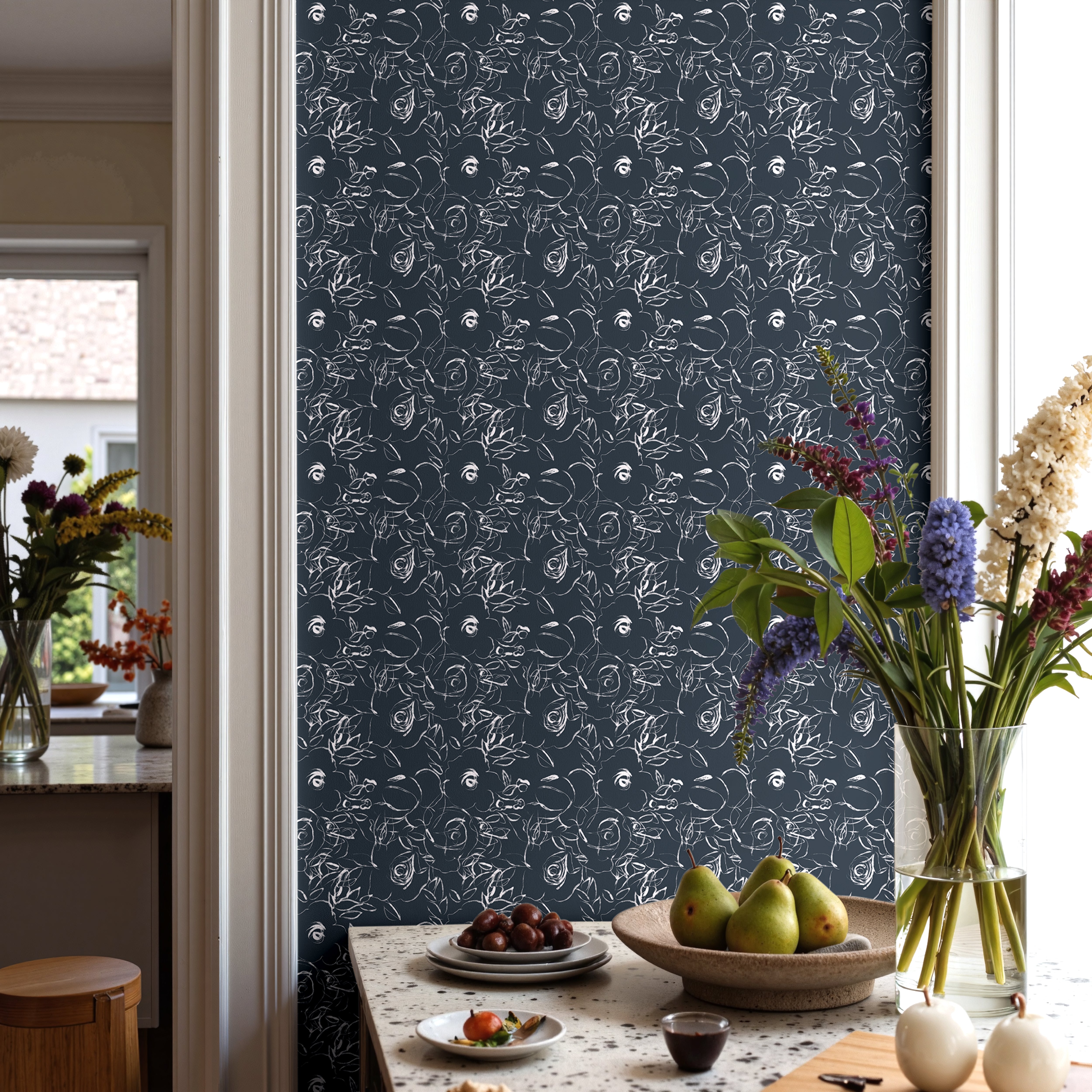 White hand drawn floral on deep navy background in a modern kitchen interior