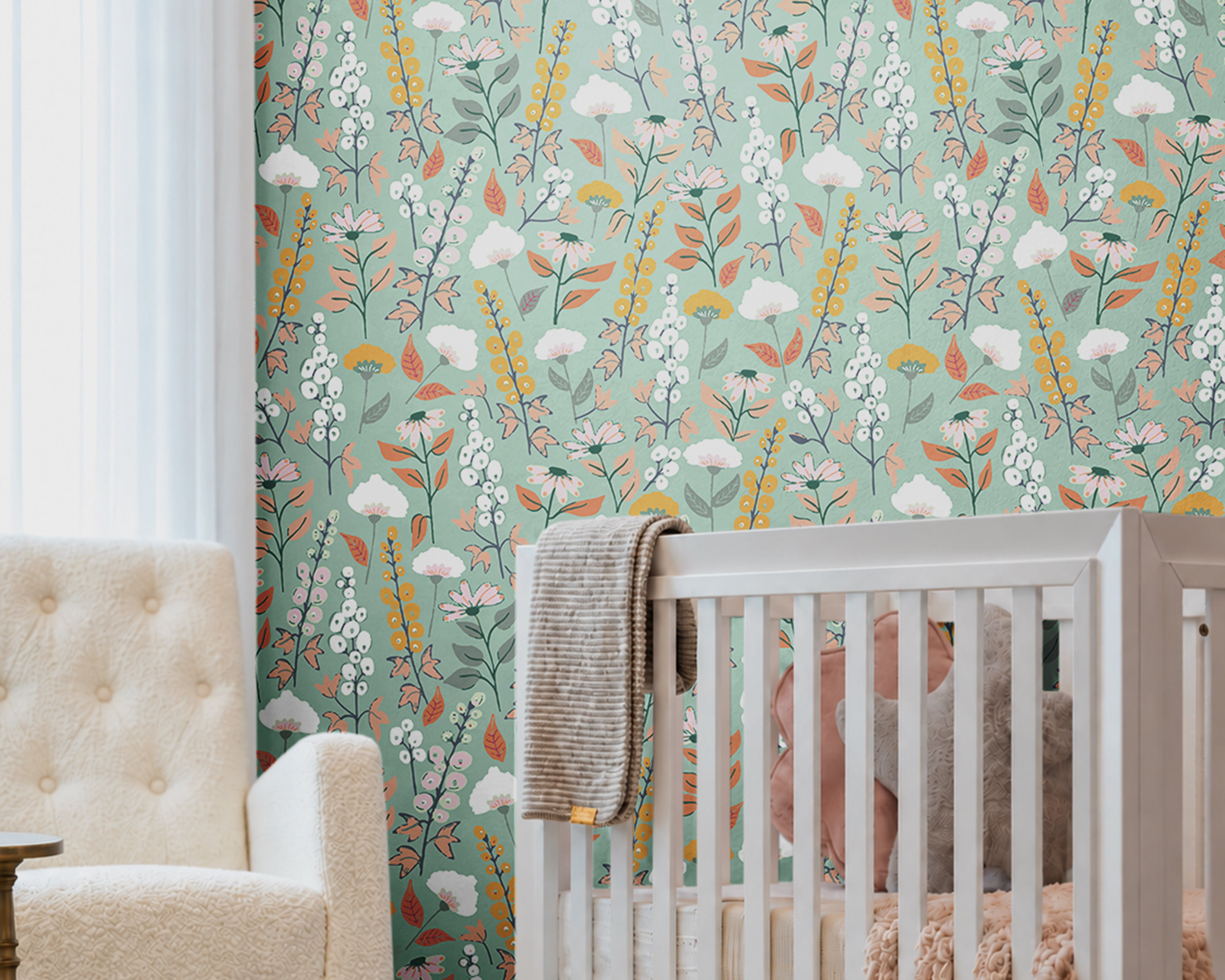 blue green background with orange pink and white wildflowers in nursery
