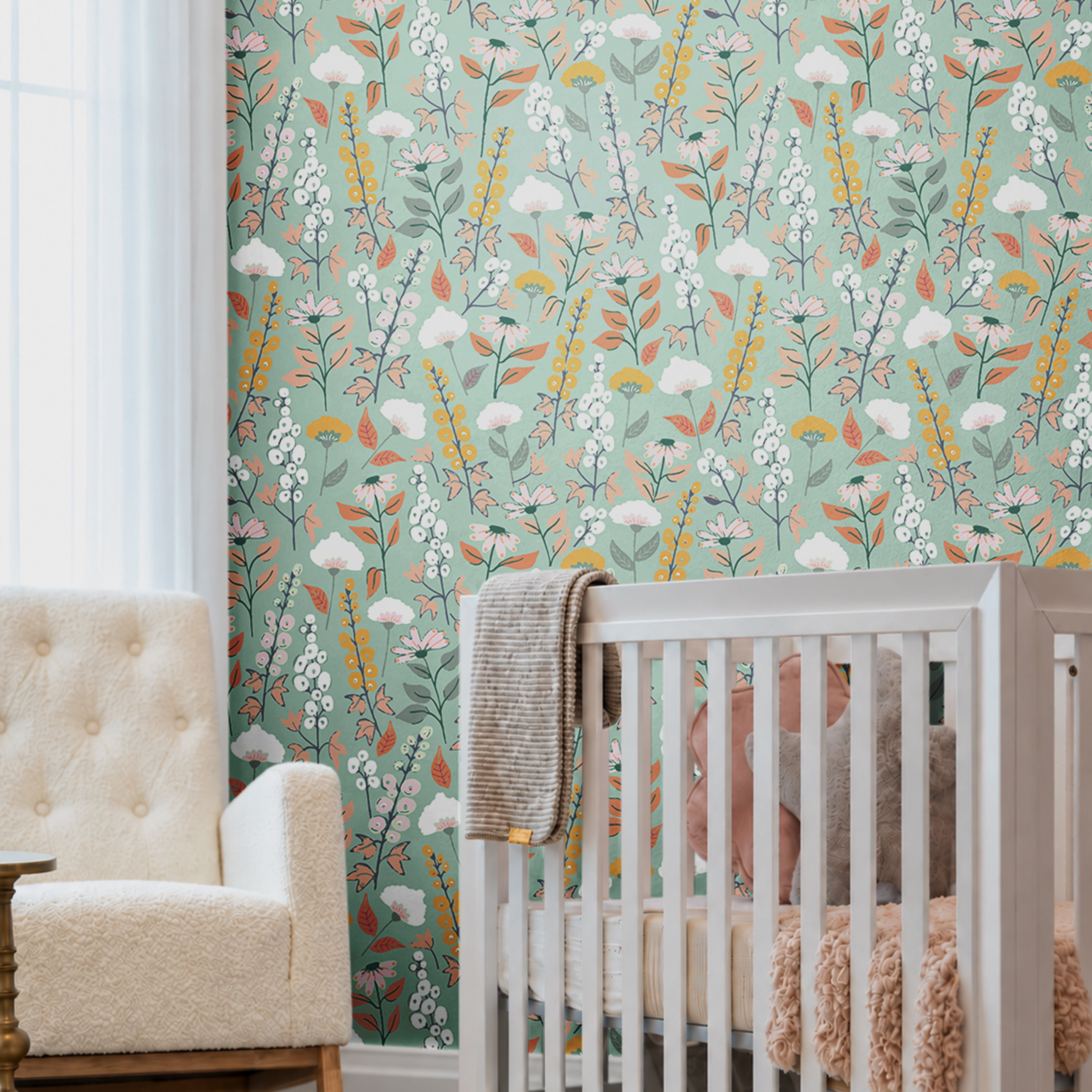 blue green background with orange pink and white wildflowers in nursery
