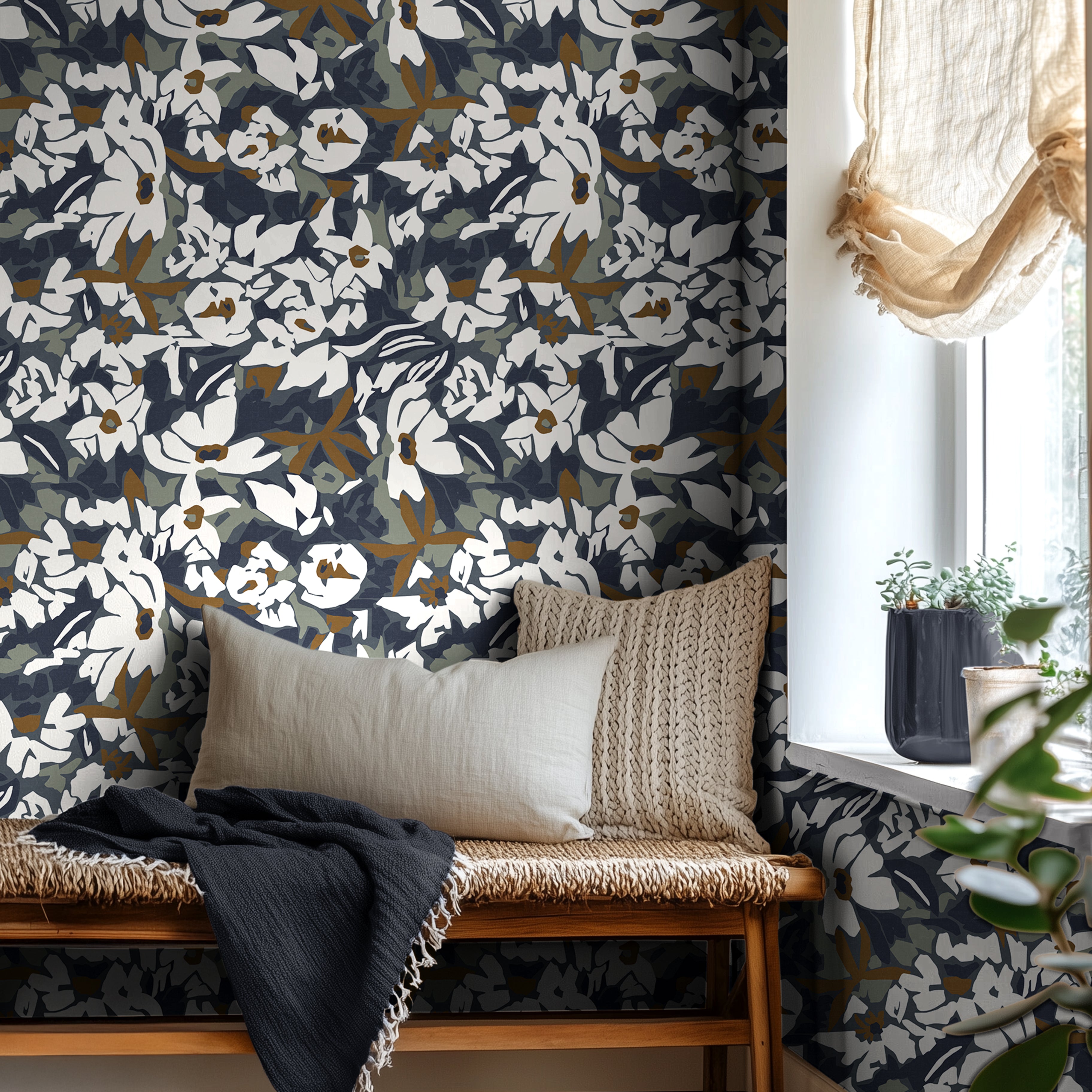 dark navy floral wallpaper in bedroom with neutral decor and natural light