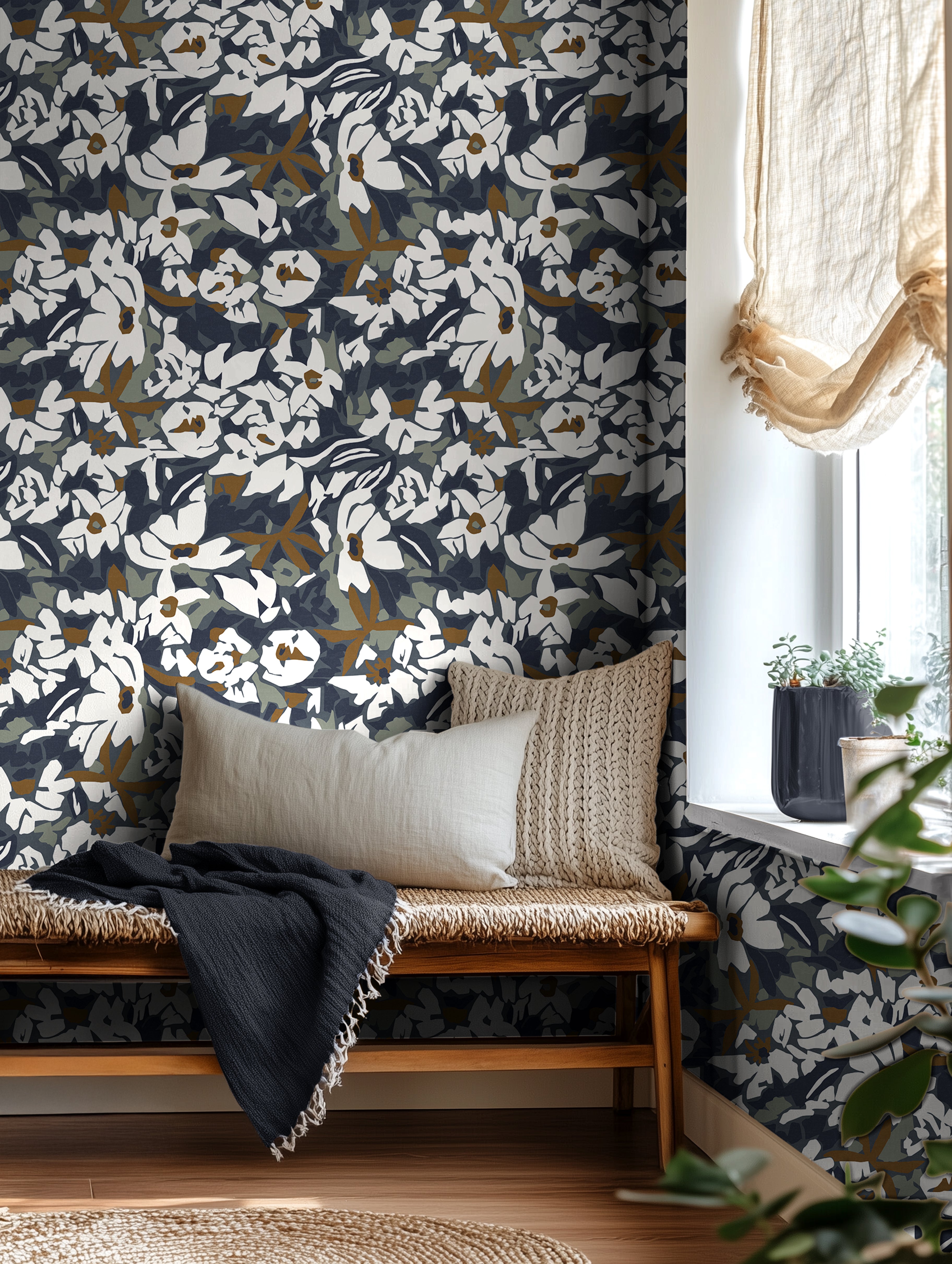 dark navy floral wallpaper in bedroom with neutral decor and natural light