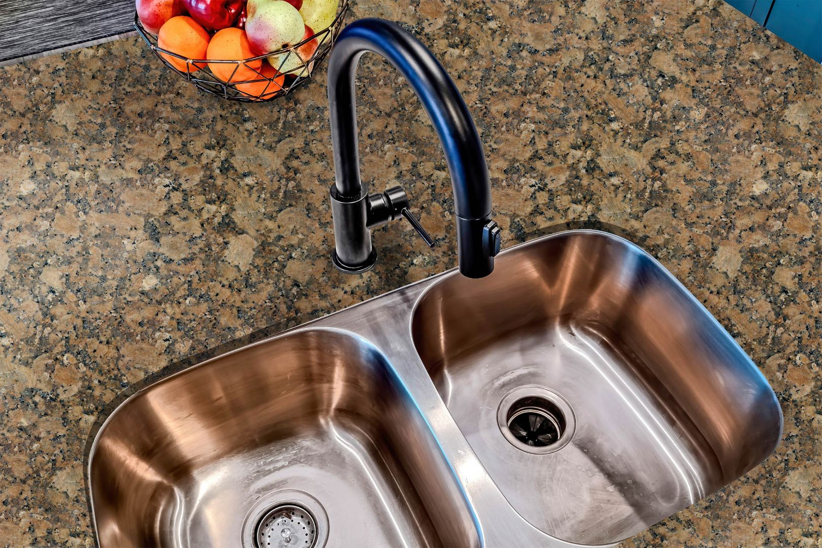 Amberstone Granite countertop film 83 installed around a kitchen sink with realistic granite texture