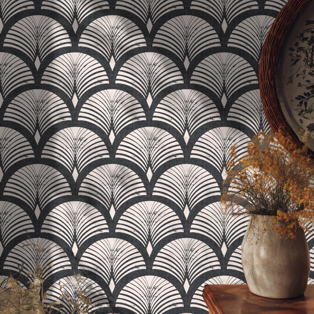 charcoal and blush art deco fan wallpaper with wood table ceramic vase dried flowers and round picture