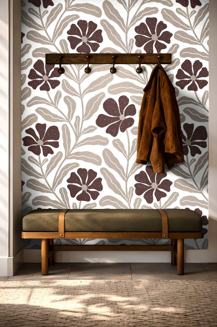 Close up of Auburnwell wallpaper showing warm auburn botanical design and textured speckled finish