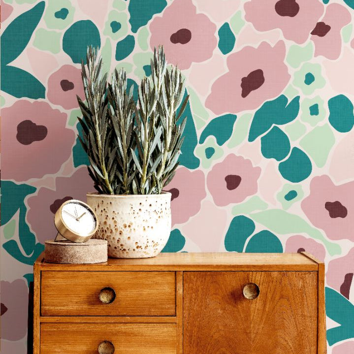 Bedroom wall with Aurora Hour Wallpaper in soft mint and coral tones, adding modern vibrancy and tranquil sophistication.