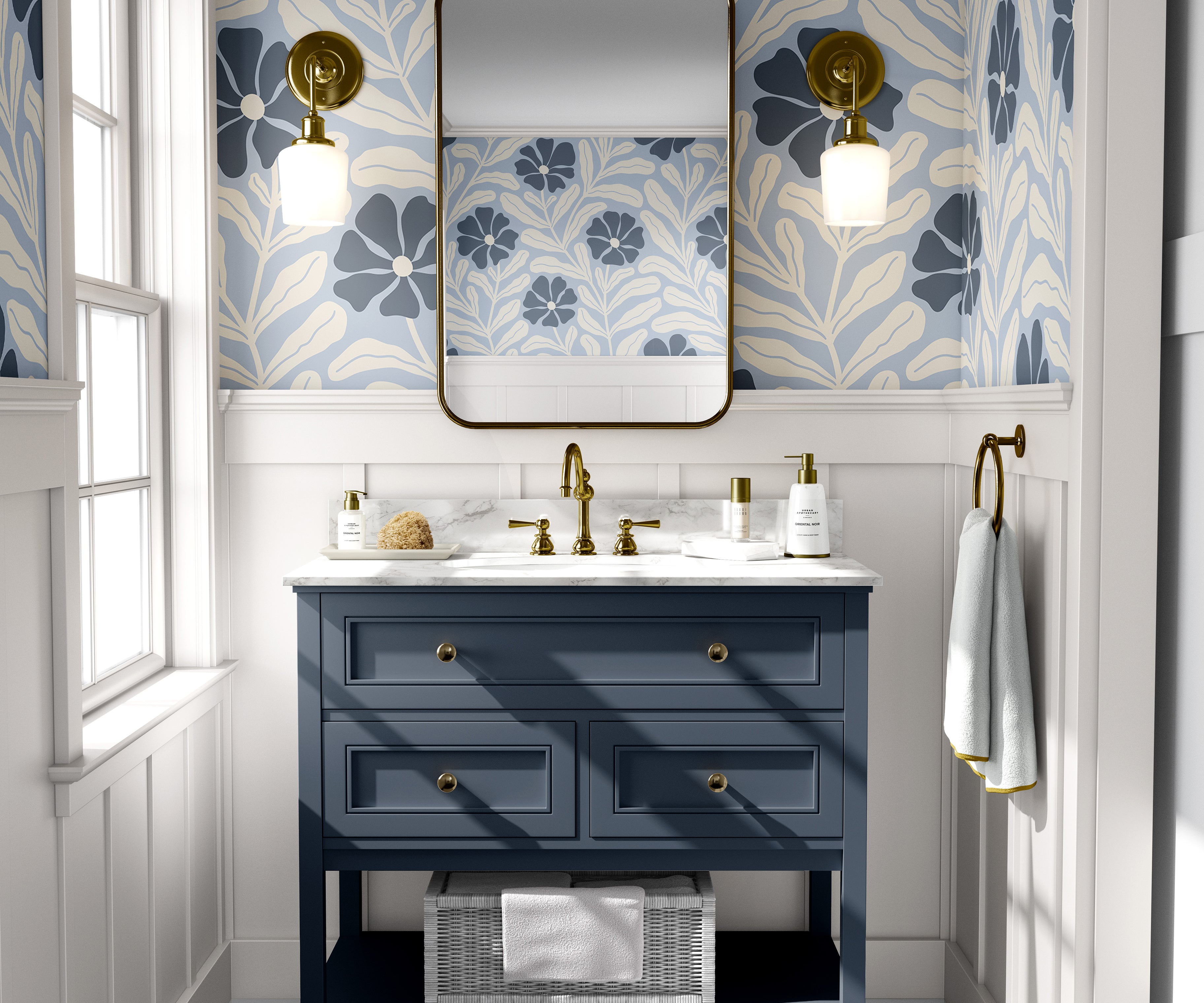 Baywell blue floral wallpaper with navy botanical flowers styled above a blue bathroom vanity with brass fixtures.