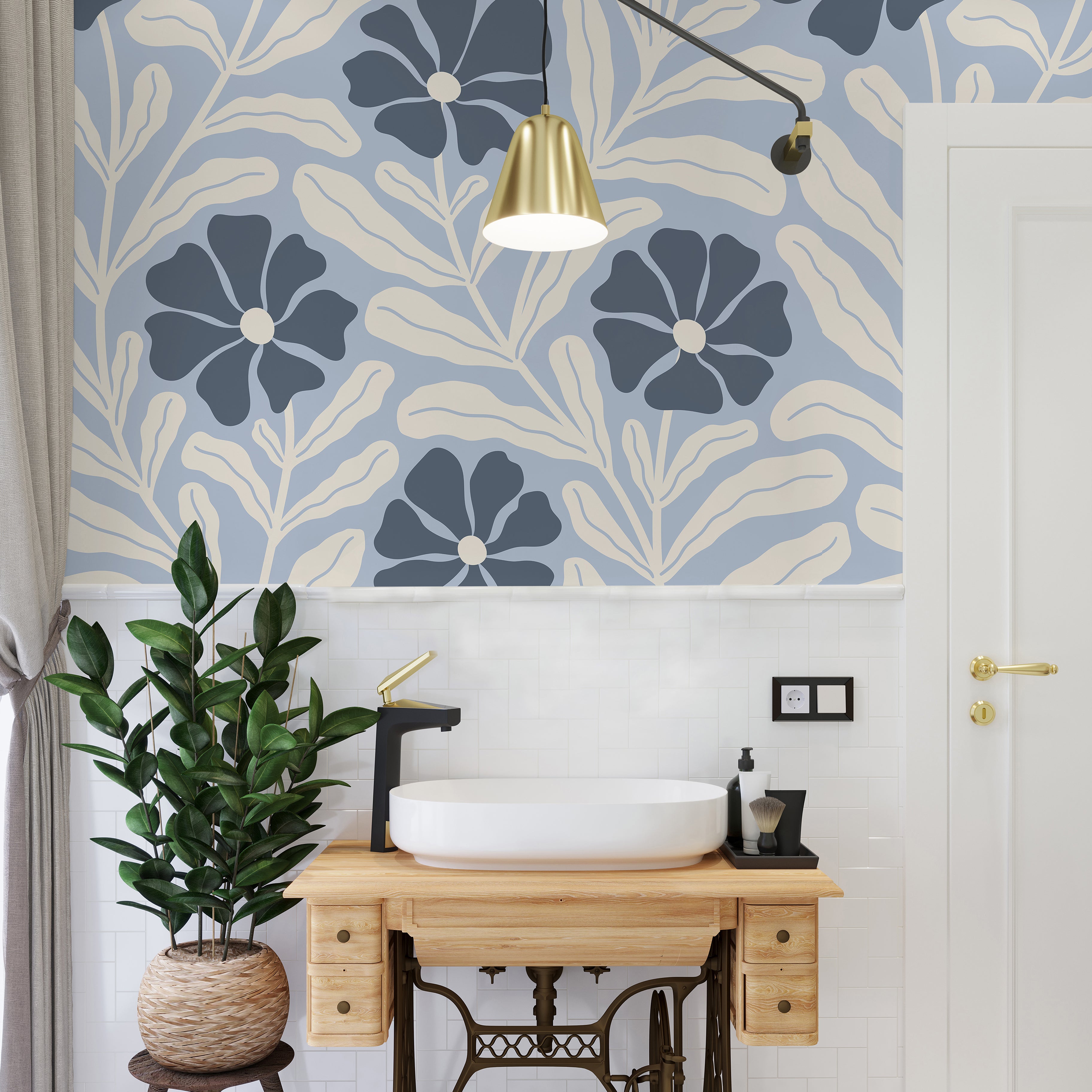 Light blue and navy botanical wallpaper styled in a bright bathroom with cream leaves, natural wood accents, and modern decor.