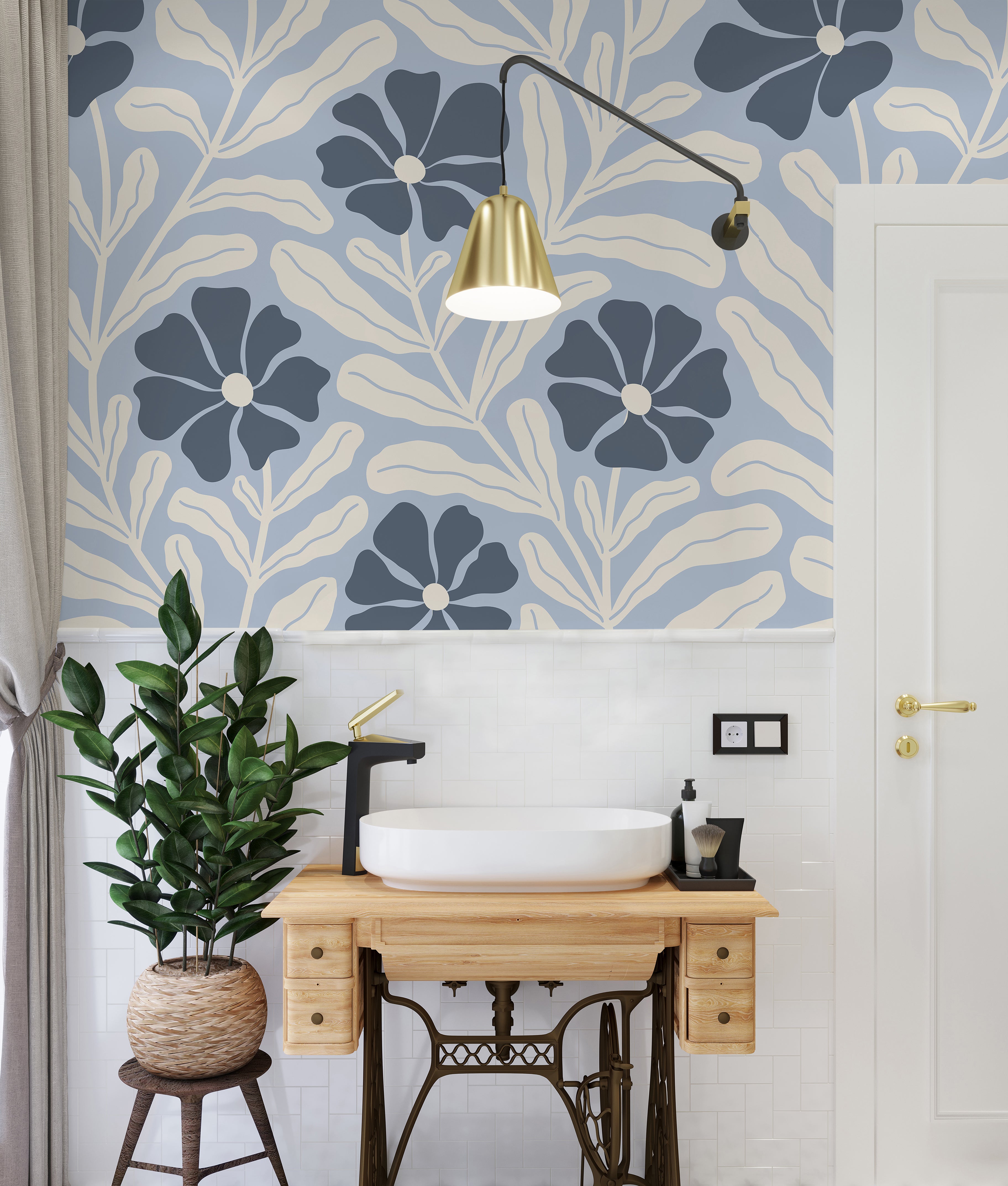 Light blue and navy botanical wallpaper styled in a bright bathroom with cream leaves, natural wood accents, and modern decor.